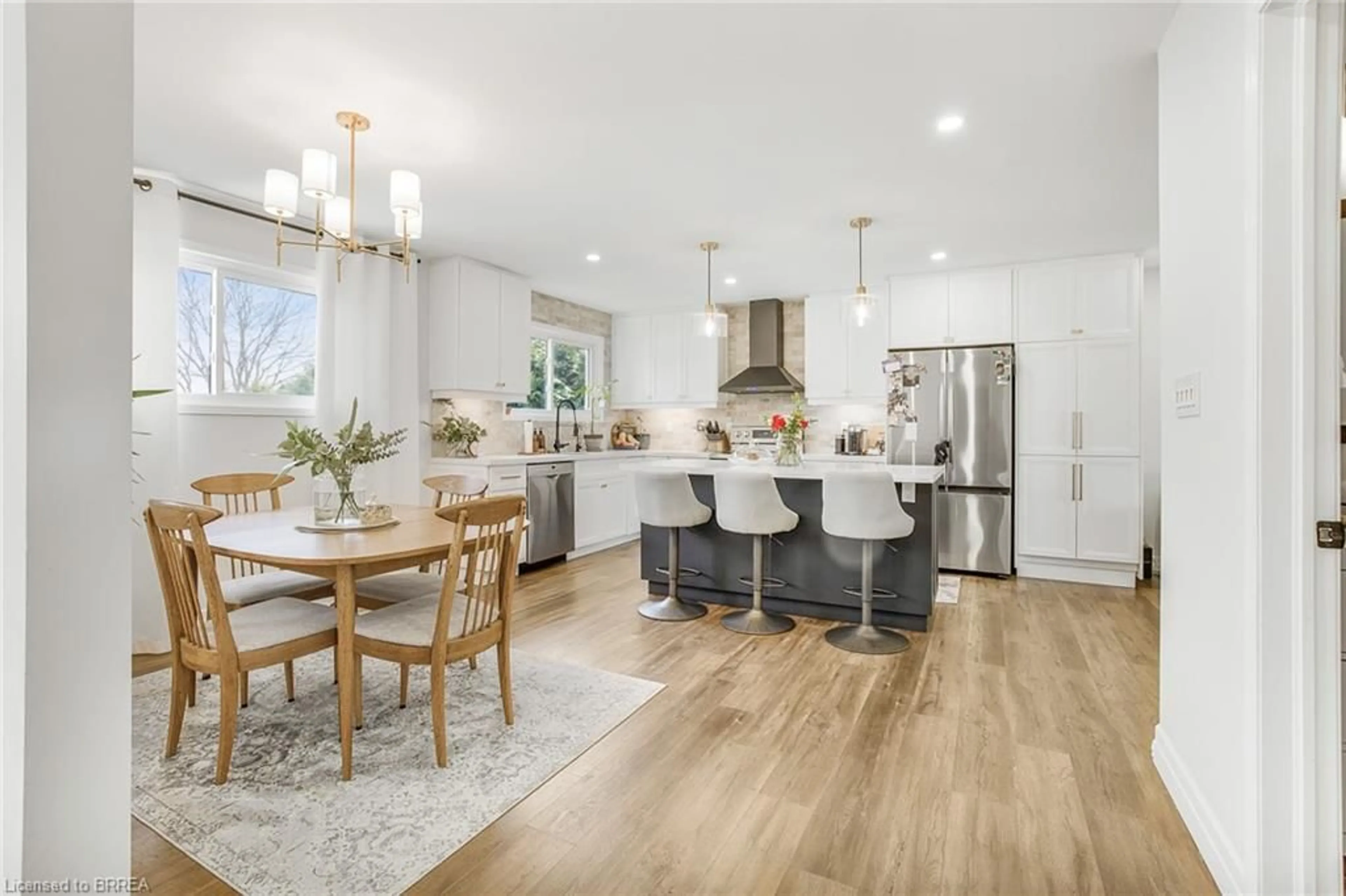 Open concept kitchen, wood/laminate floor for 5 Evergreen Crt, Brantford Ontario N3T 6J5