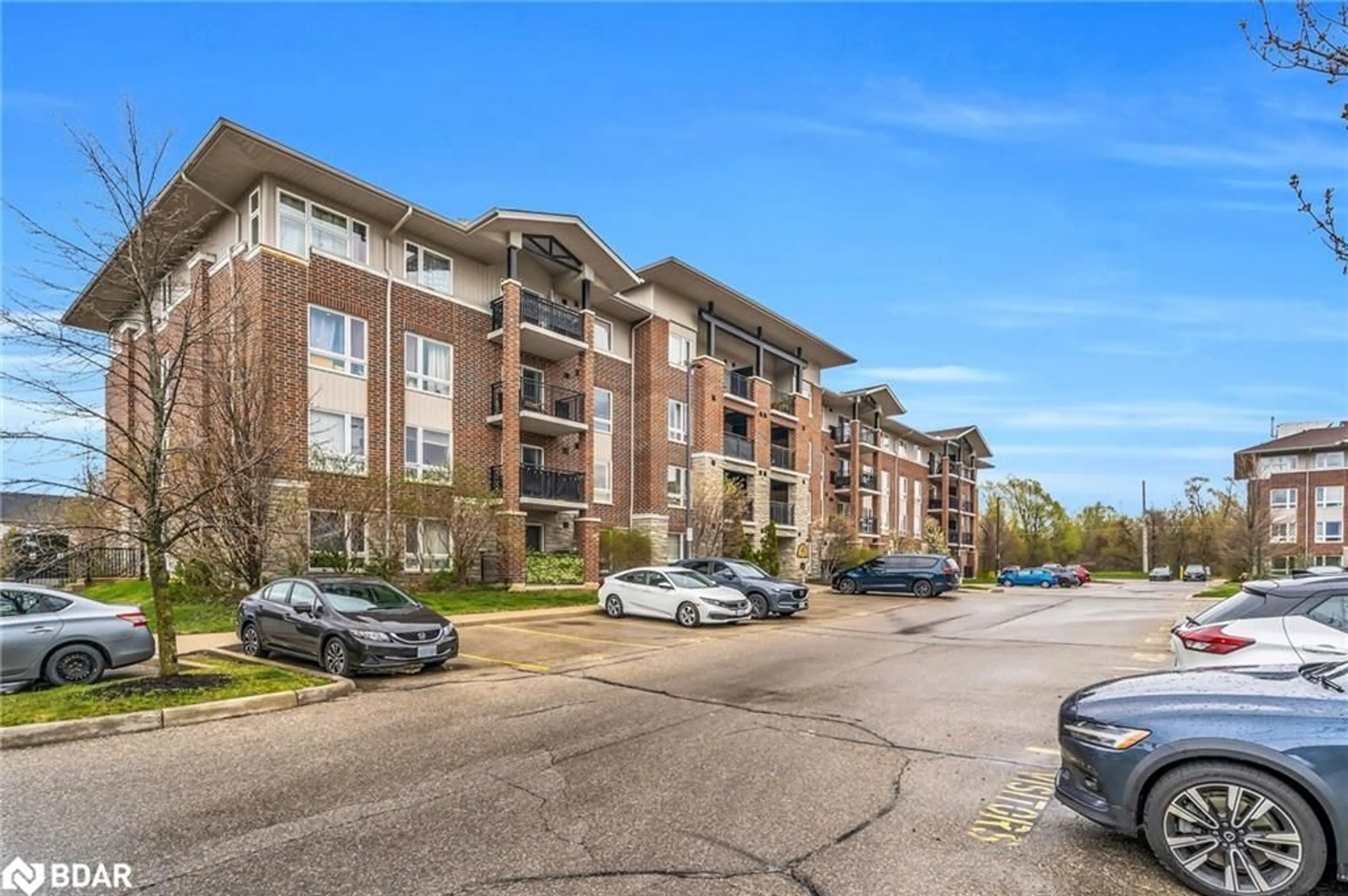 A pic from outside/outdoor area/front of a property/back of a property/a pic from drone, unknown for 41 Goodwin Dr #401, Guelph Ontario N1L 0E7
