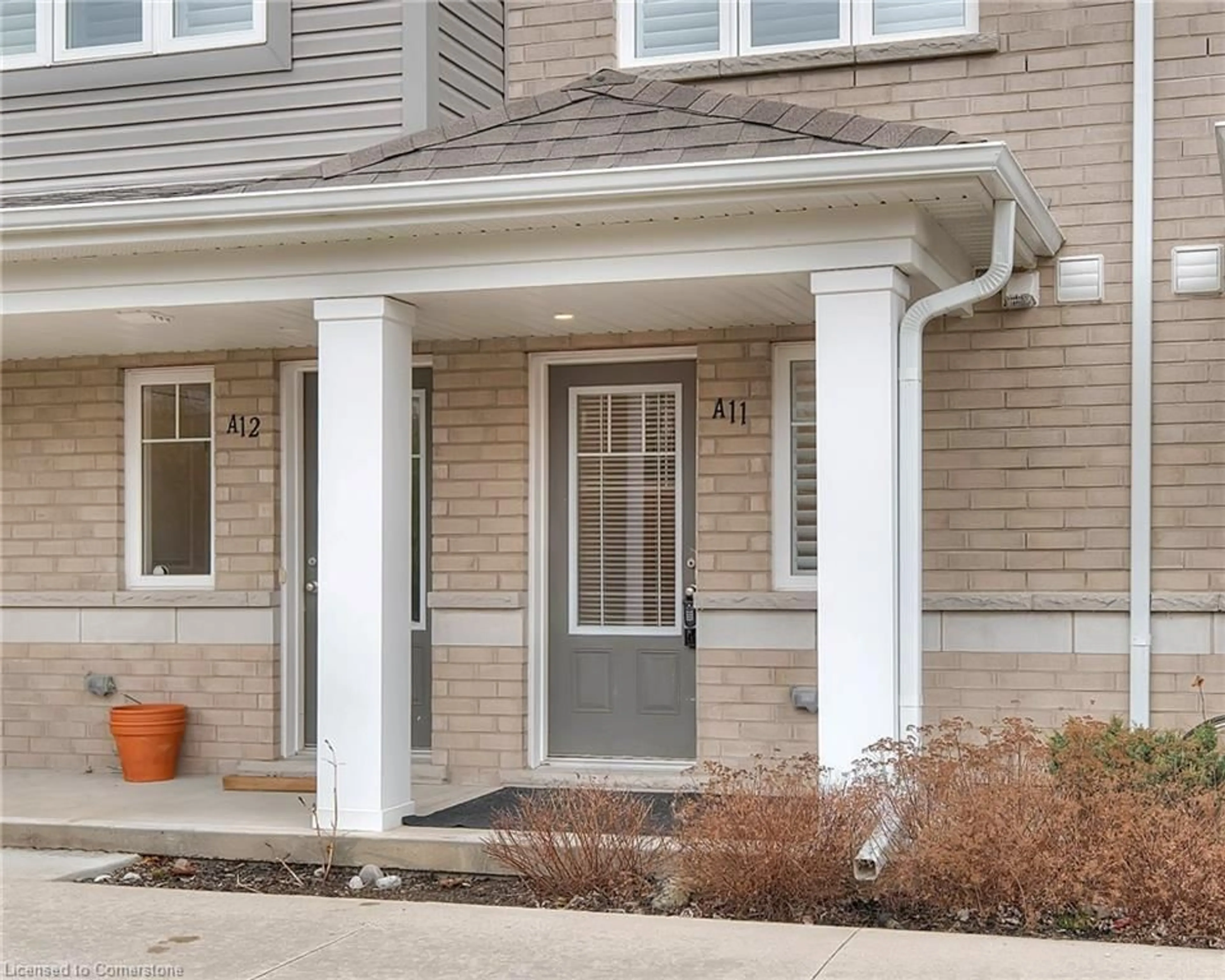 Home with brick exterior material, street for 24 Morrison Rd #A11, Kitchener Ontario N2A 0L1
