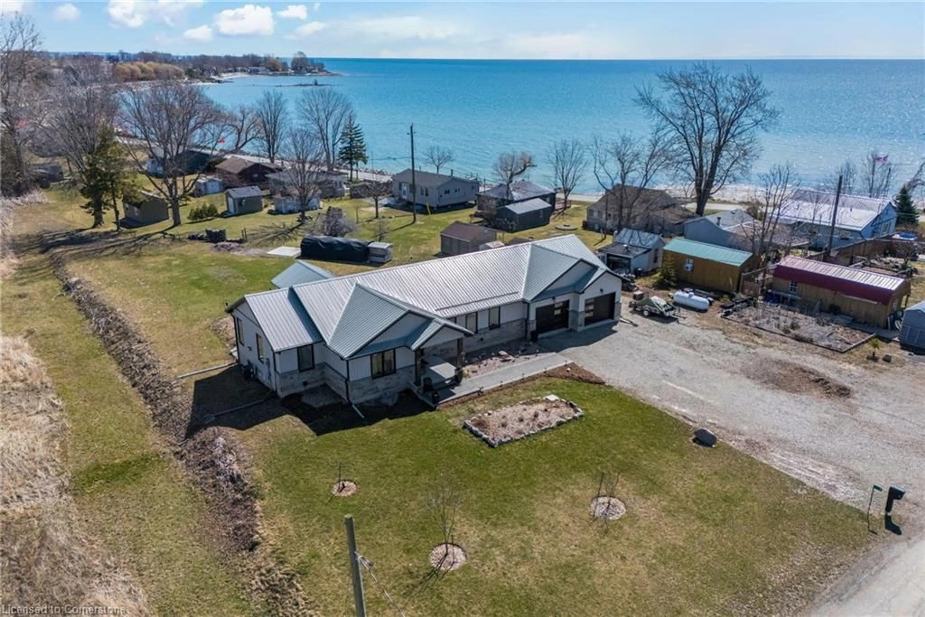 A pic from outside/outdoor area/front of a property/back of a property/a pic from drone, water/lake/river/ocean view for 8 Reicheld Rd, Selkirk Ontario N0A 1P0