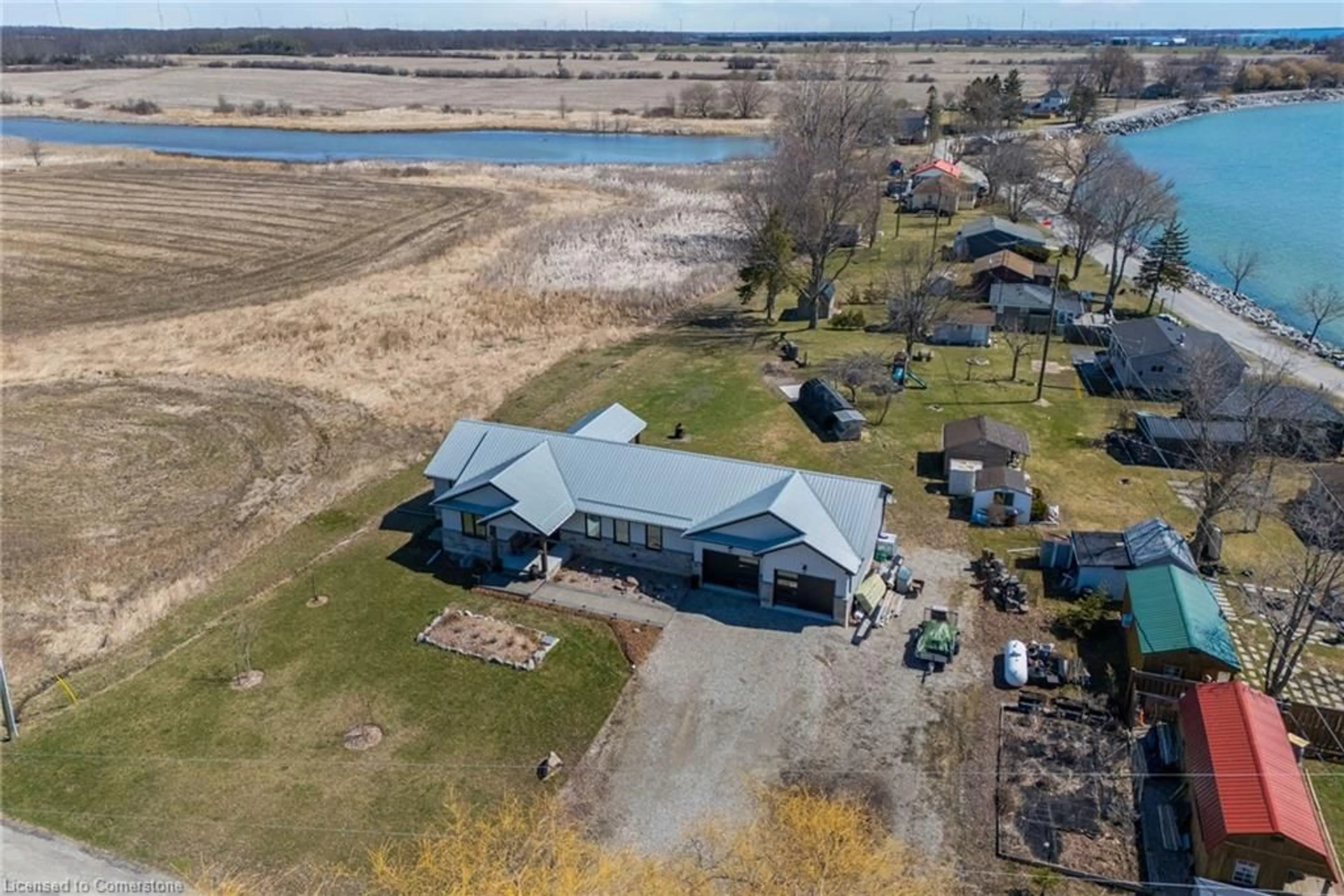 A pic from outside/outdoor area/front of a property/back of a property/a pic from drone, water/lake/river/ocean view for 8 Reicheld Rd, Selkirk Ontario N0A 1P0