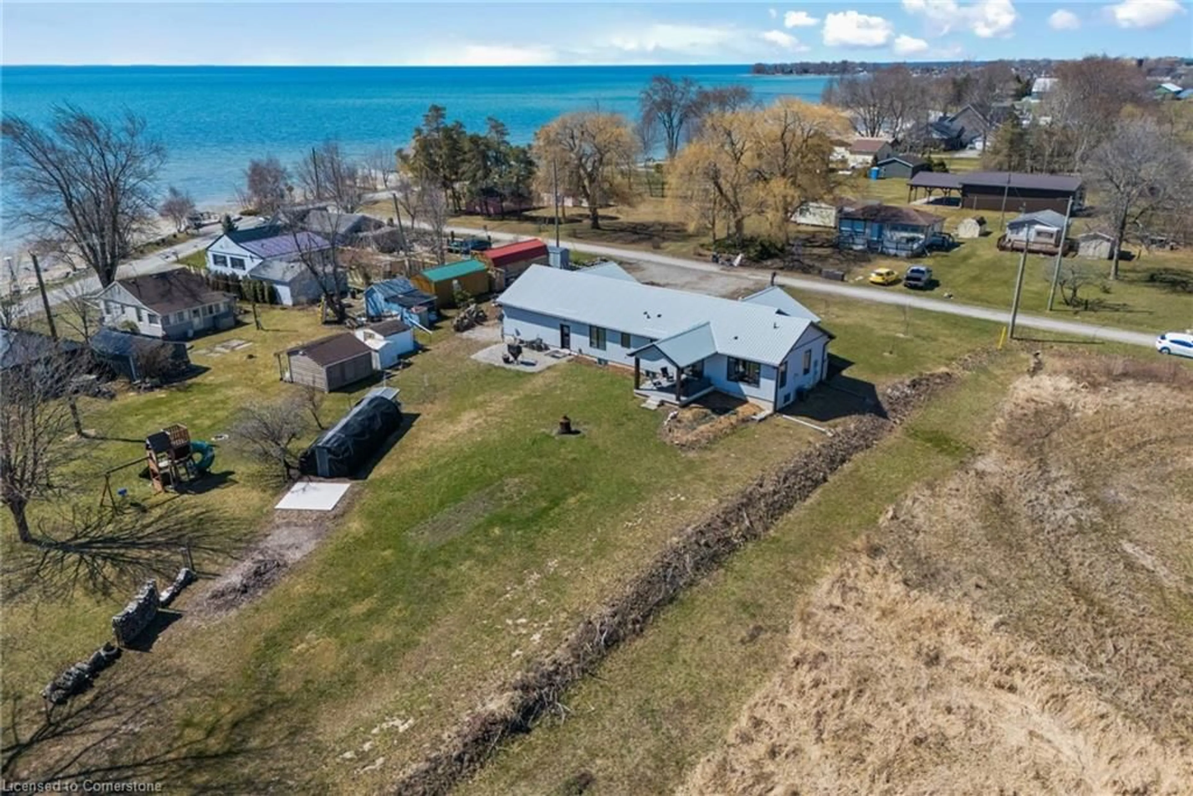 A pic from outside/outdoor area/front of a property/back of a property/a pic from drone, water/lake/river/ocean view for 8 Reicheld Rd, Selkirk Ontario N0A 1P0