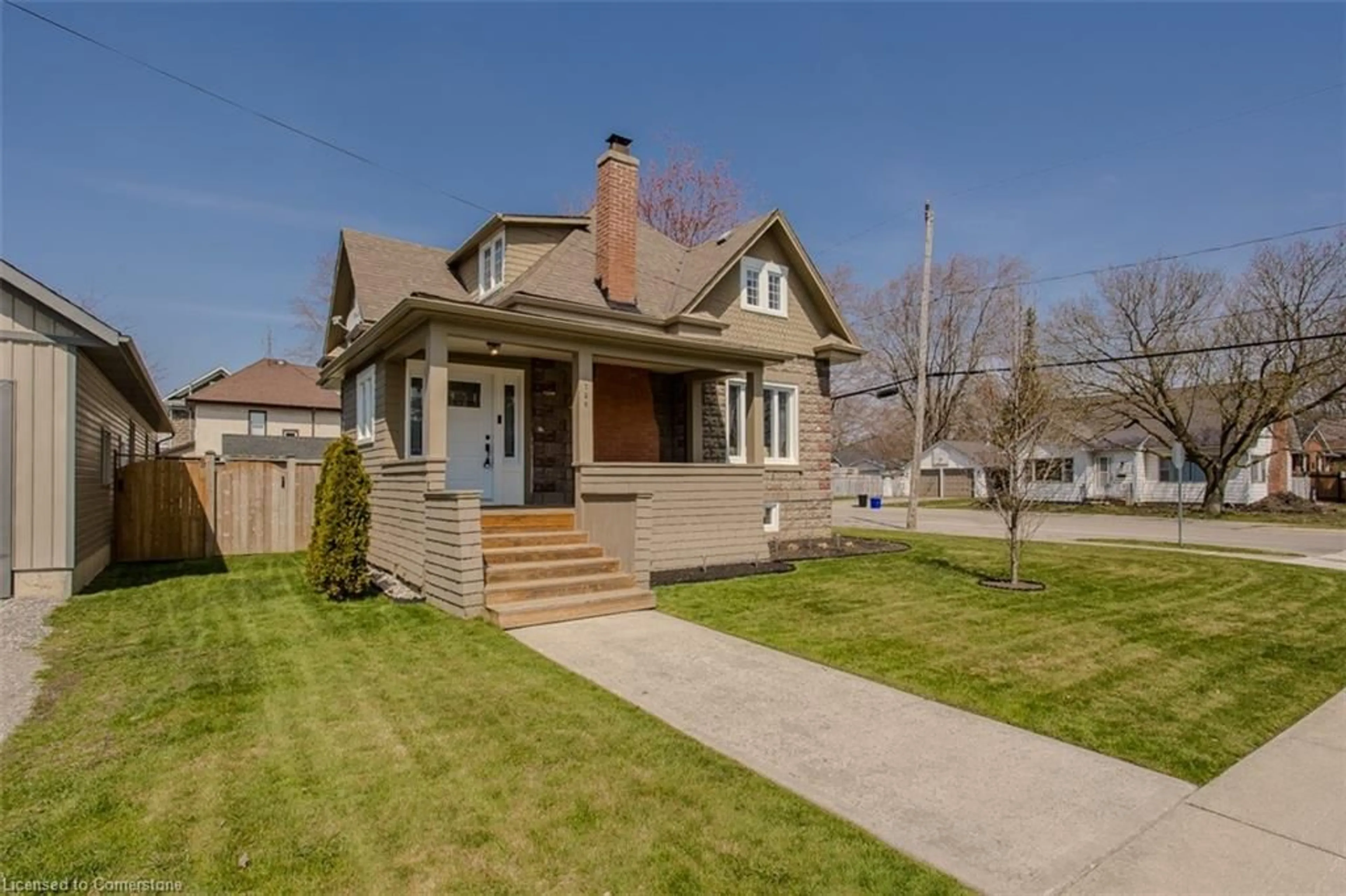 Home with brick exterior material, street for 728 Cedar St, Dunnville Ontario N1A 2J8