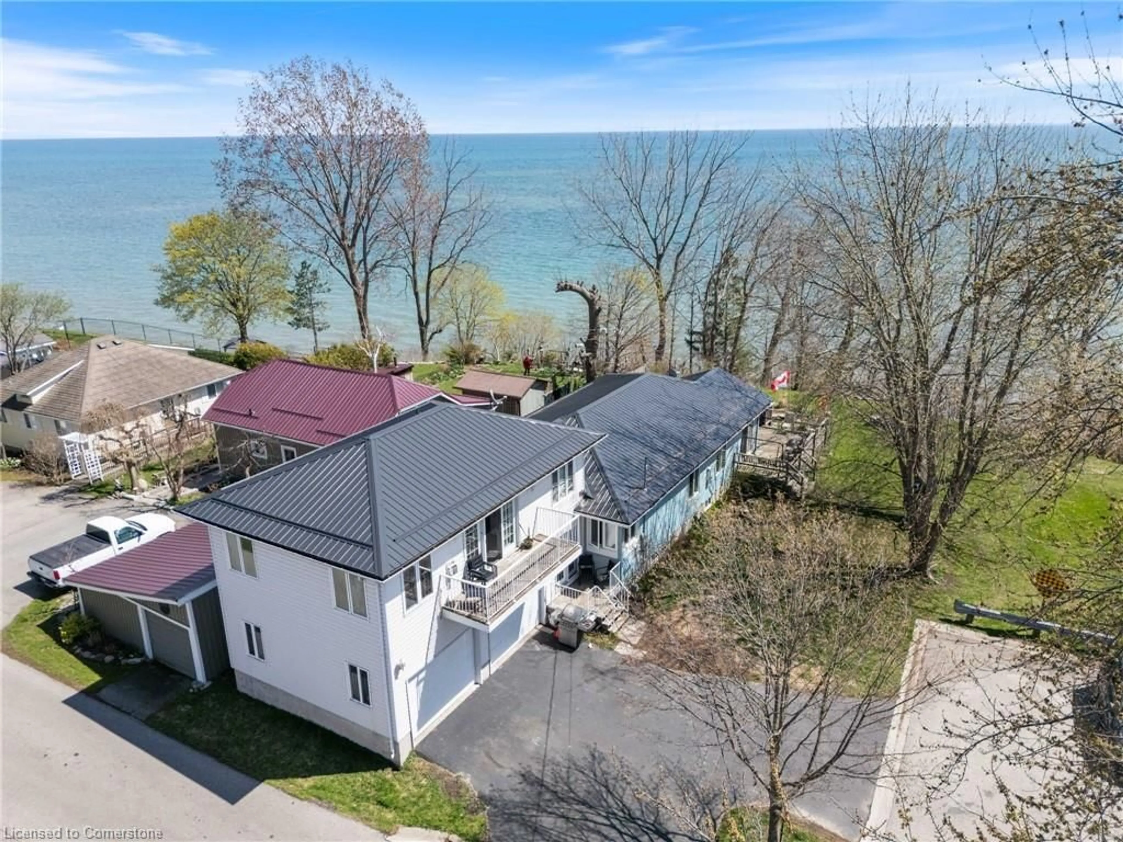 A pic from outside/outdoor area/front of a property/back of a property/a pic from drone, water/lake/river/ocean view for 2 Buena St, Port Dover Ontario N0A 1N7