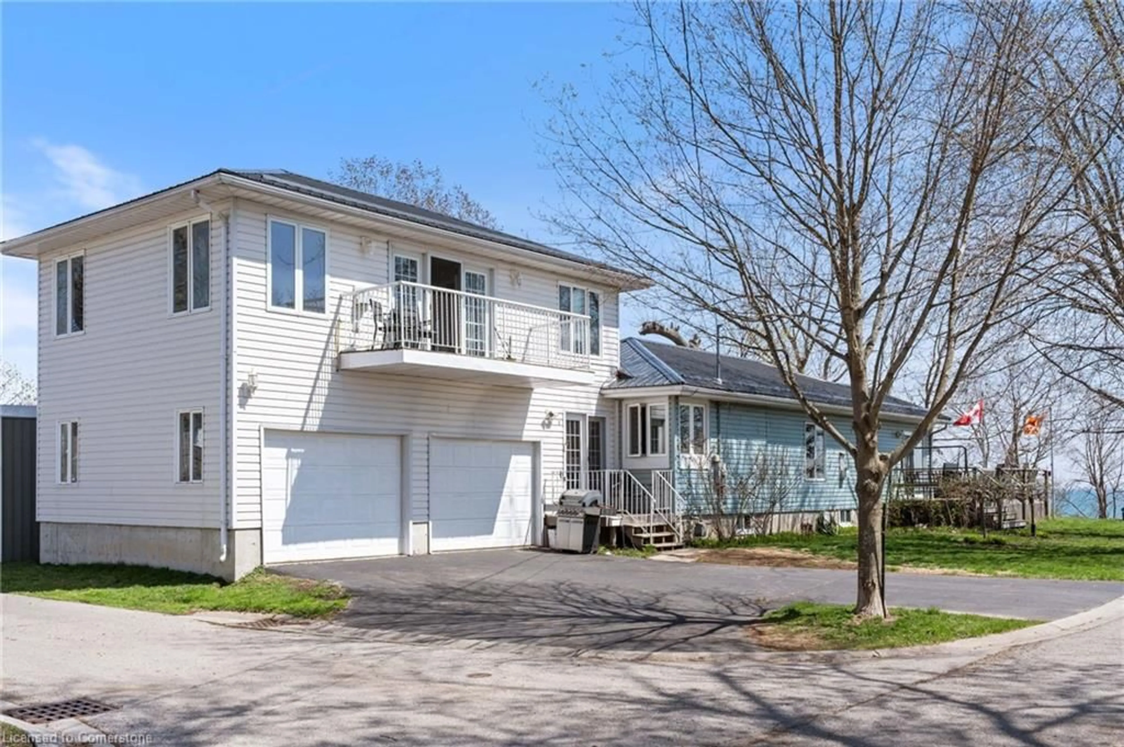 Home with vinyl exterior material, street for 2 Buena St, Port Dover Ontario N0A 1N7