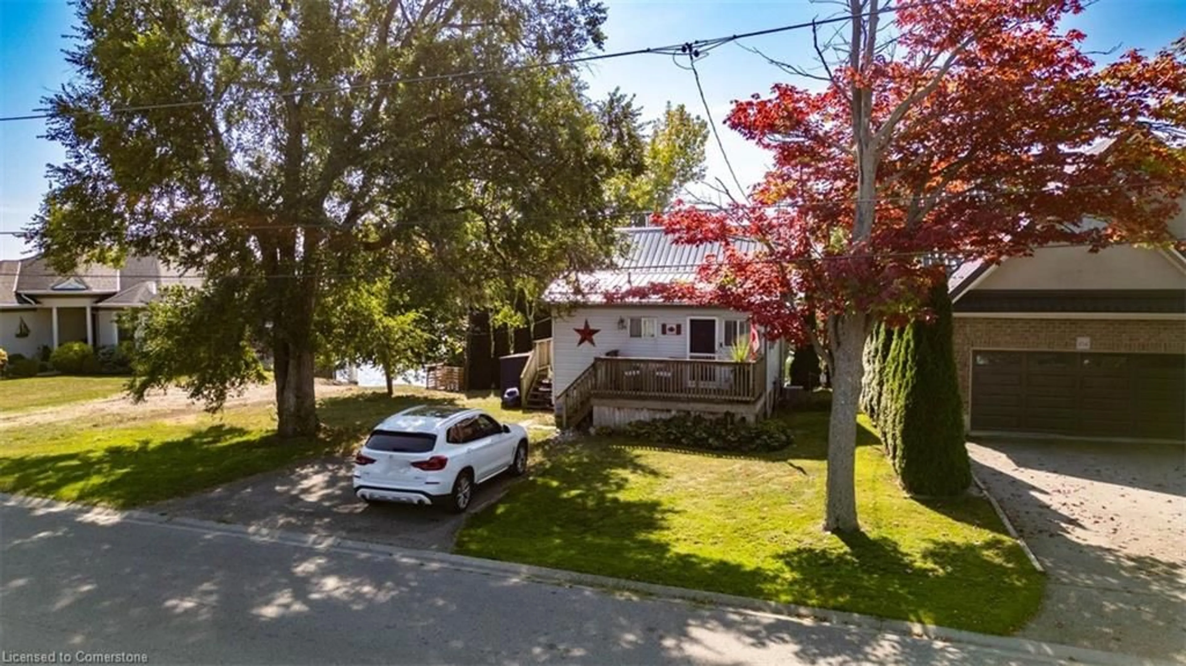 A pic from outside/outdoor area/front of a property/back of a property/a pic from drone, street for 106 Brown St, Port Dover Ontario N0A 1N7