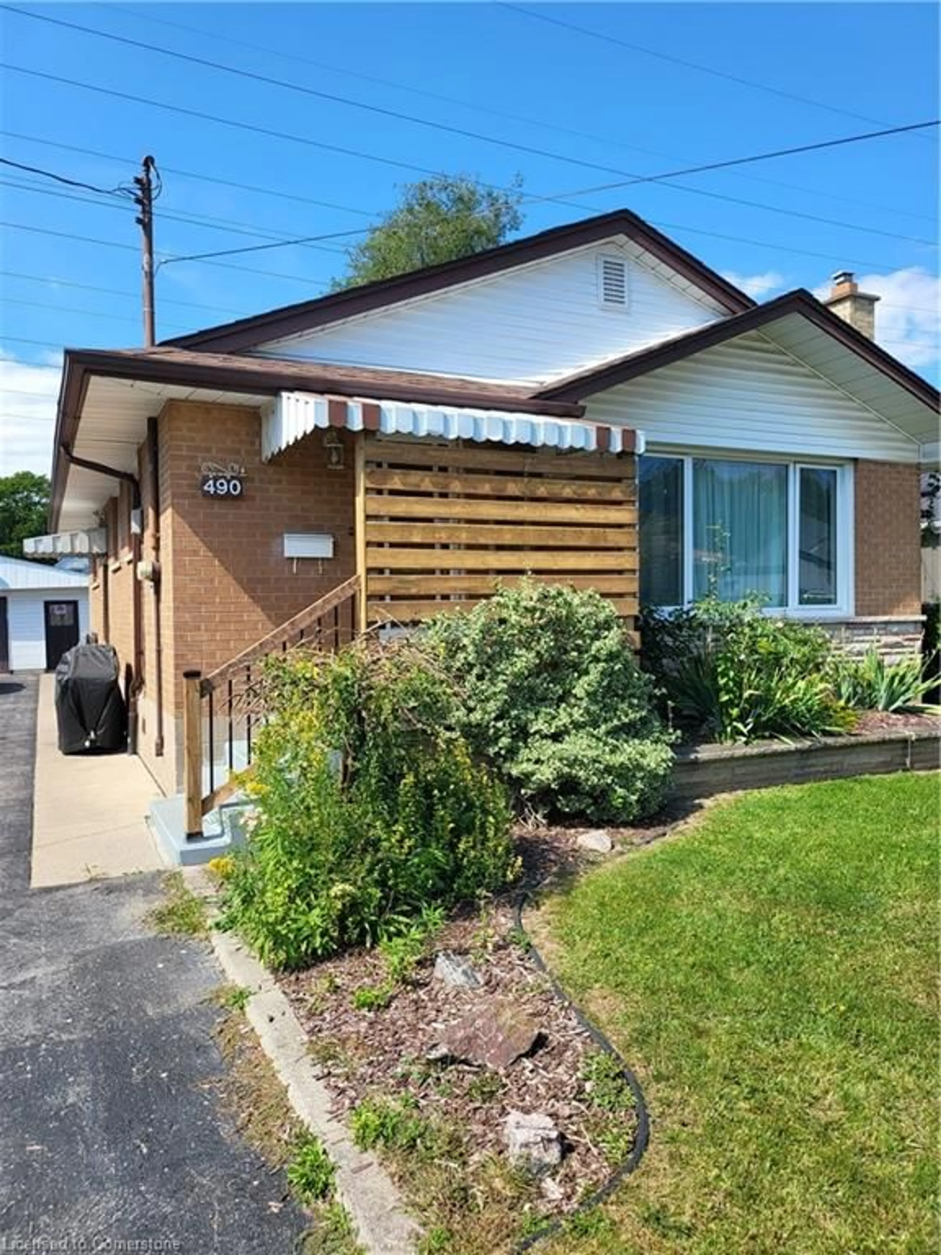 Home with brick exterior material, street for 490 Cochrane Rd, Hamilton Ontario L8K 3H3