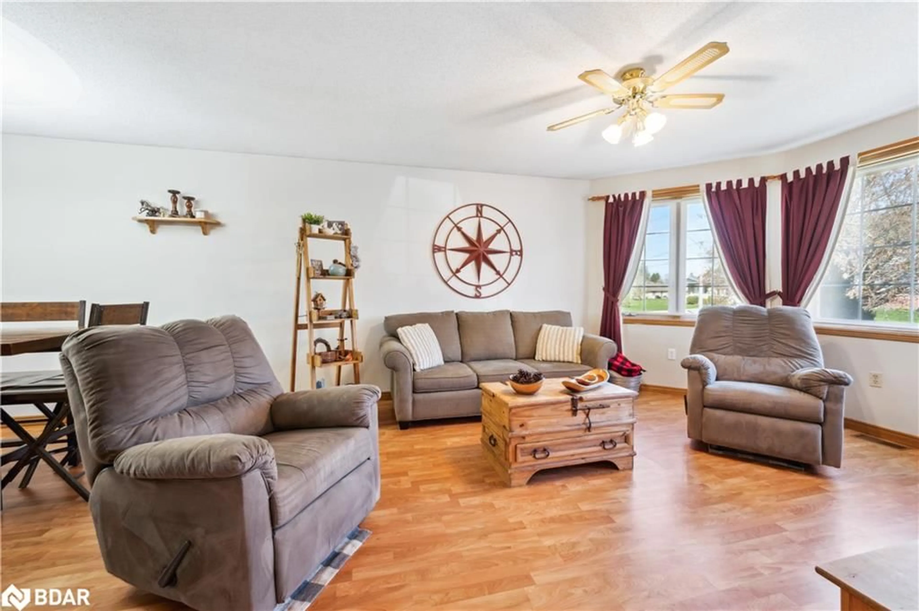 Living room with furniture, wood/laminate floor for 320 Bell St, Palmerston Ontario N0G 2P0