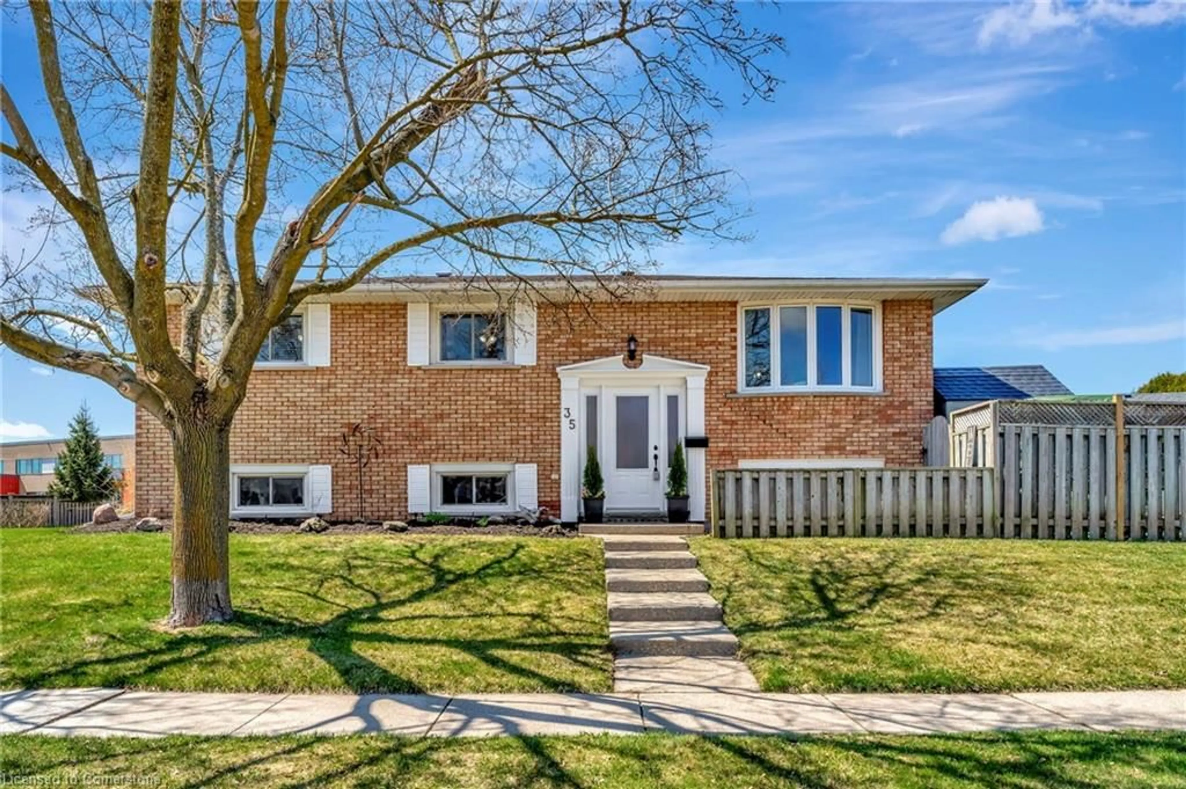 Home with brick exterior material, street for 35 Bakersfield Dr, Cambridge Ontario N1R 7B3