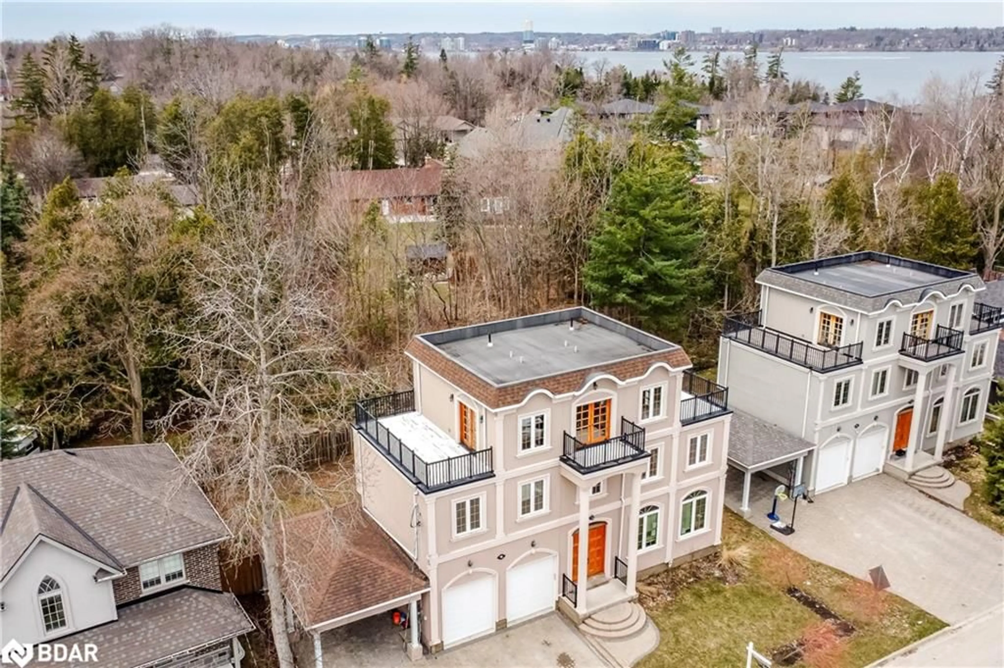 A pic from outside/outdoor area/front of a property/back of a property/a pic from drone, water/lake/river/ocean view for 16 Gray Lane, Barrie Ontario L4N 7T1