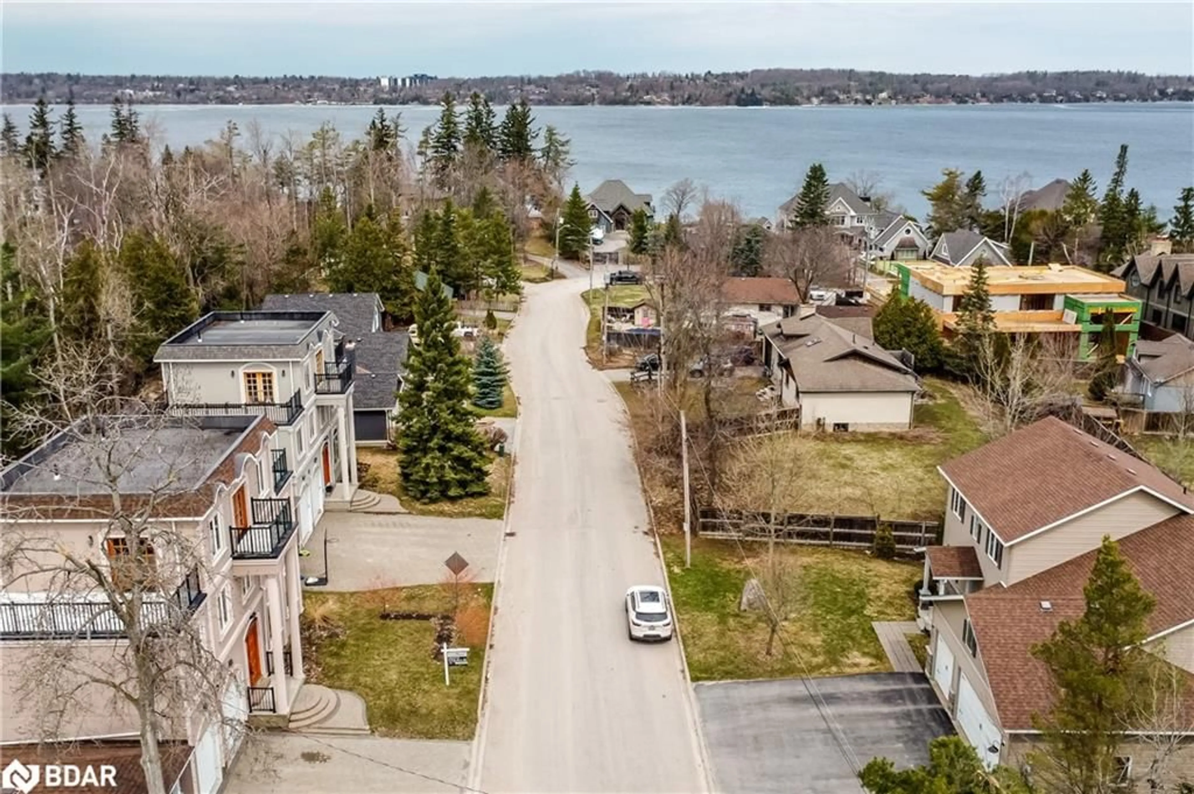 A pic from outside/outdoor area/front of a property/back of a property/a pic from drone, water/lake/river/ocean view for 16 Gray Lane, Barrie Ontario L4N 7T1