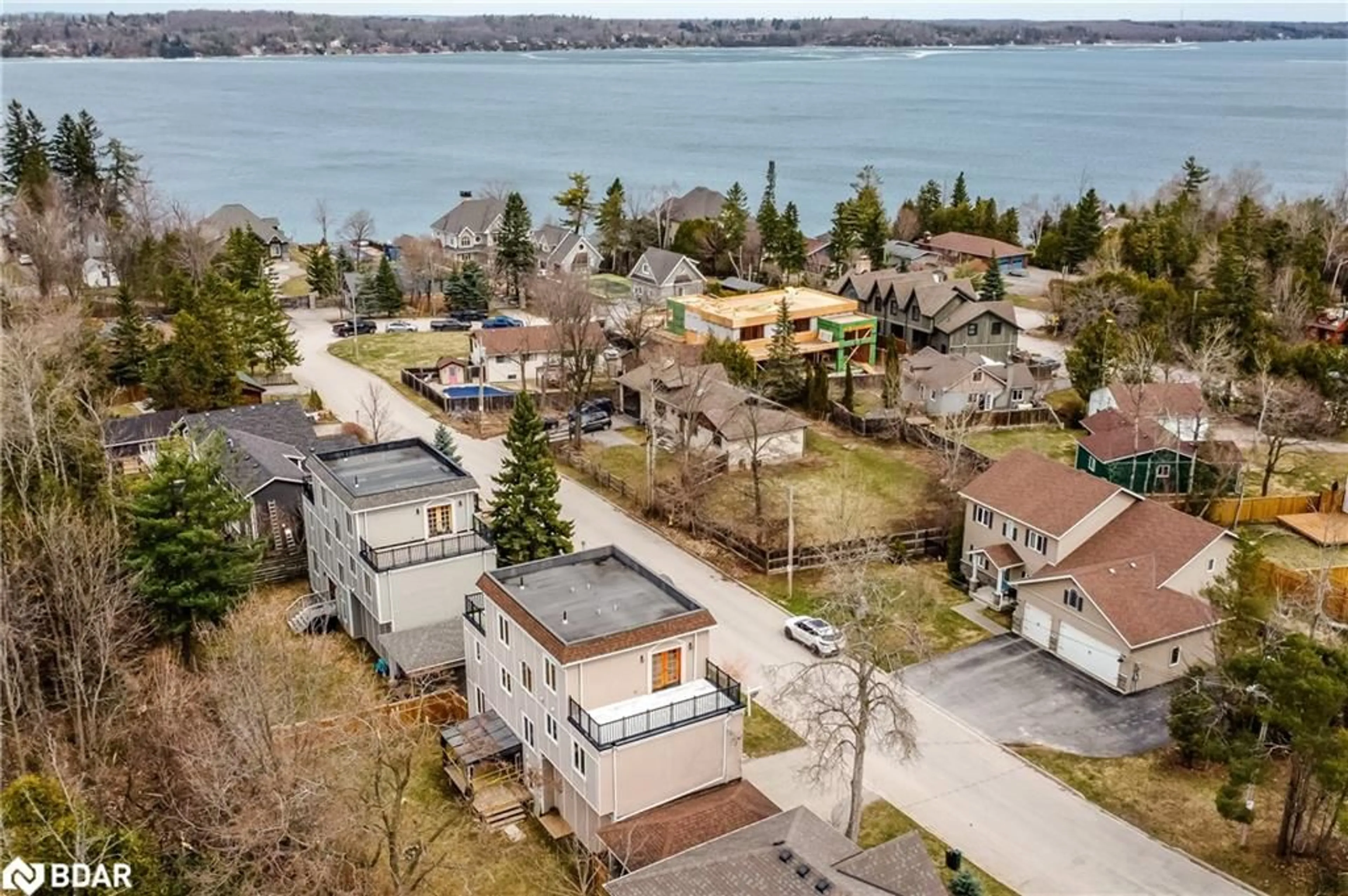 A pic from outside/outdoor area/front of a property/back of a property/a pic from drone, water/lake/river/ocean view for 16 Gray Lane, Barrie Ontario L4N 7T1