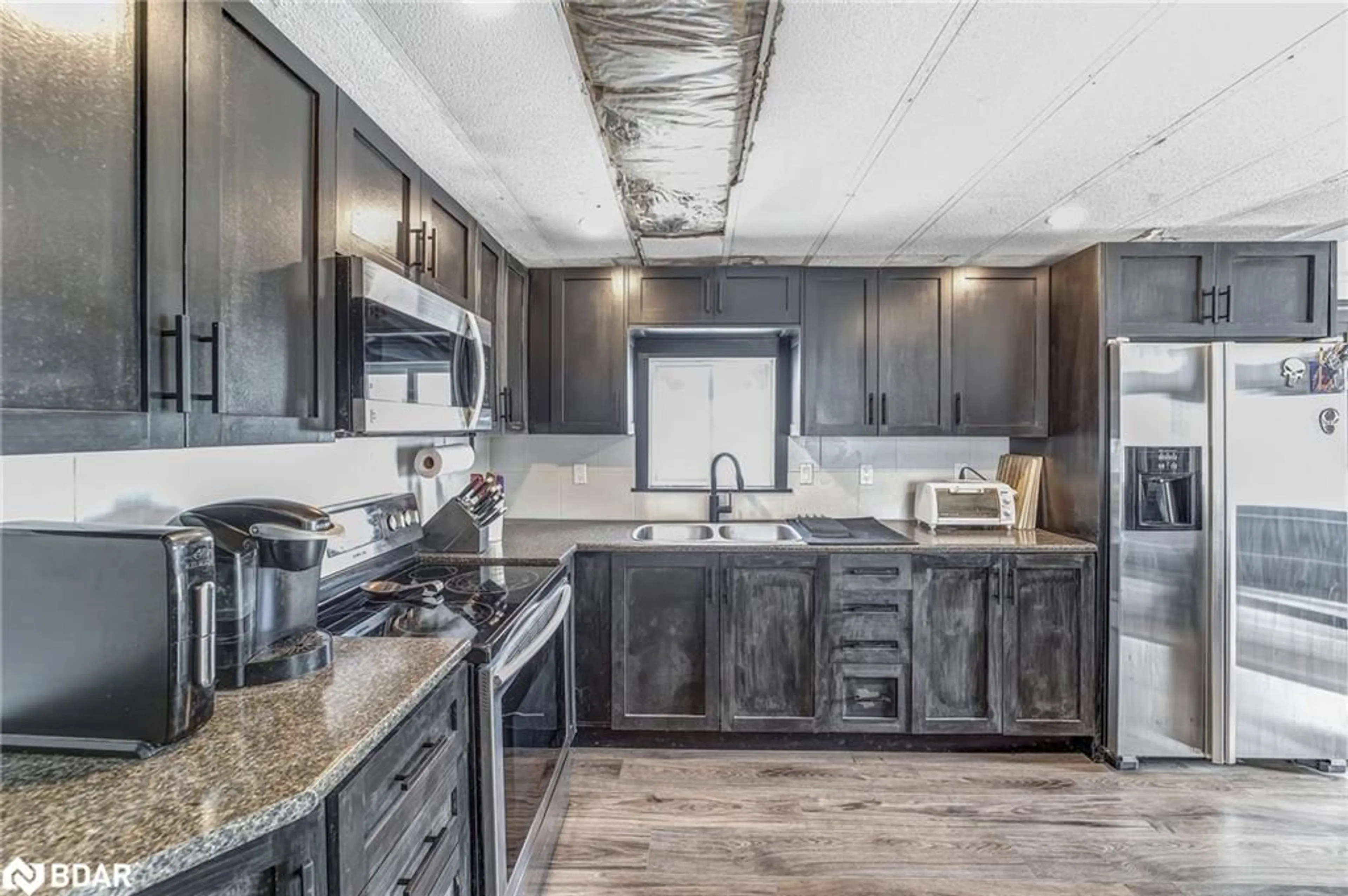 Open concept kitchen, unknown for 2 East St, Angus Ontario L0M 1B1