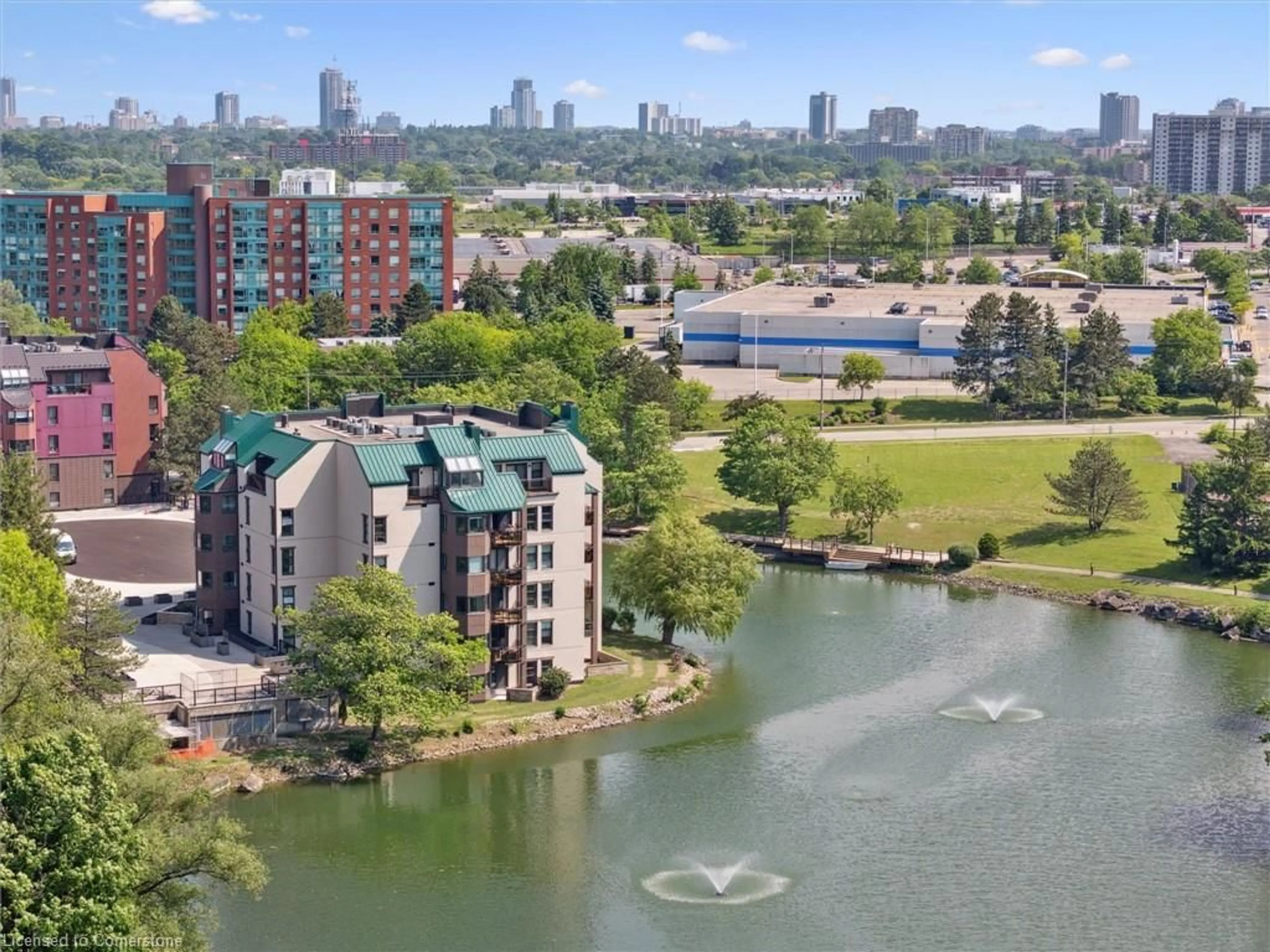 A pic from outside/outdoor area/front of a property/back of a property/a pic from drone, water/lake/river/ocean view for 54 Blue Springs Dr #62, Waterloo Ontario N2J 4M4