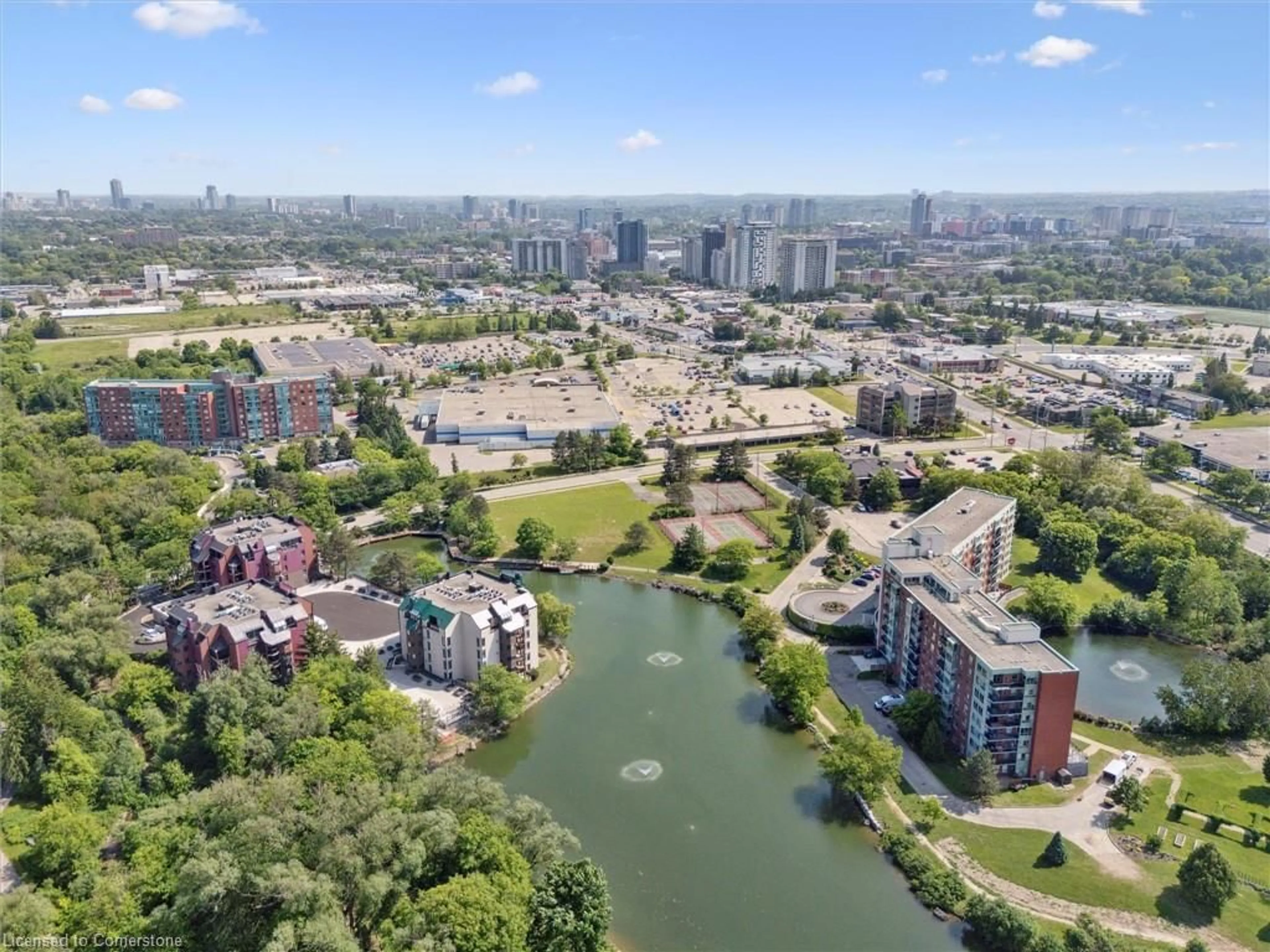 A pic from outside/outdoor area/front of a property/back of a property/a pic from drone, water/lake/river/ocean view for 54 Blue Springs Dr #62, Waterloo Ontario N2J 4M4