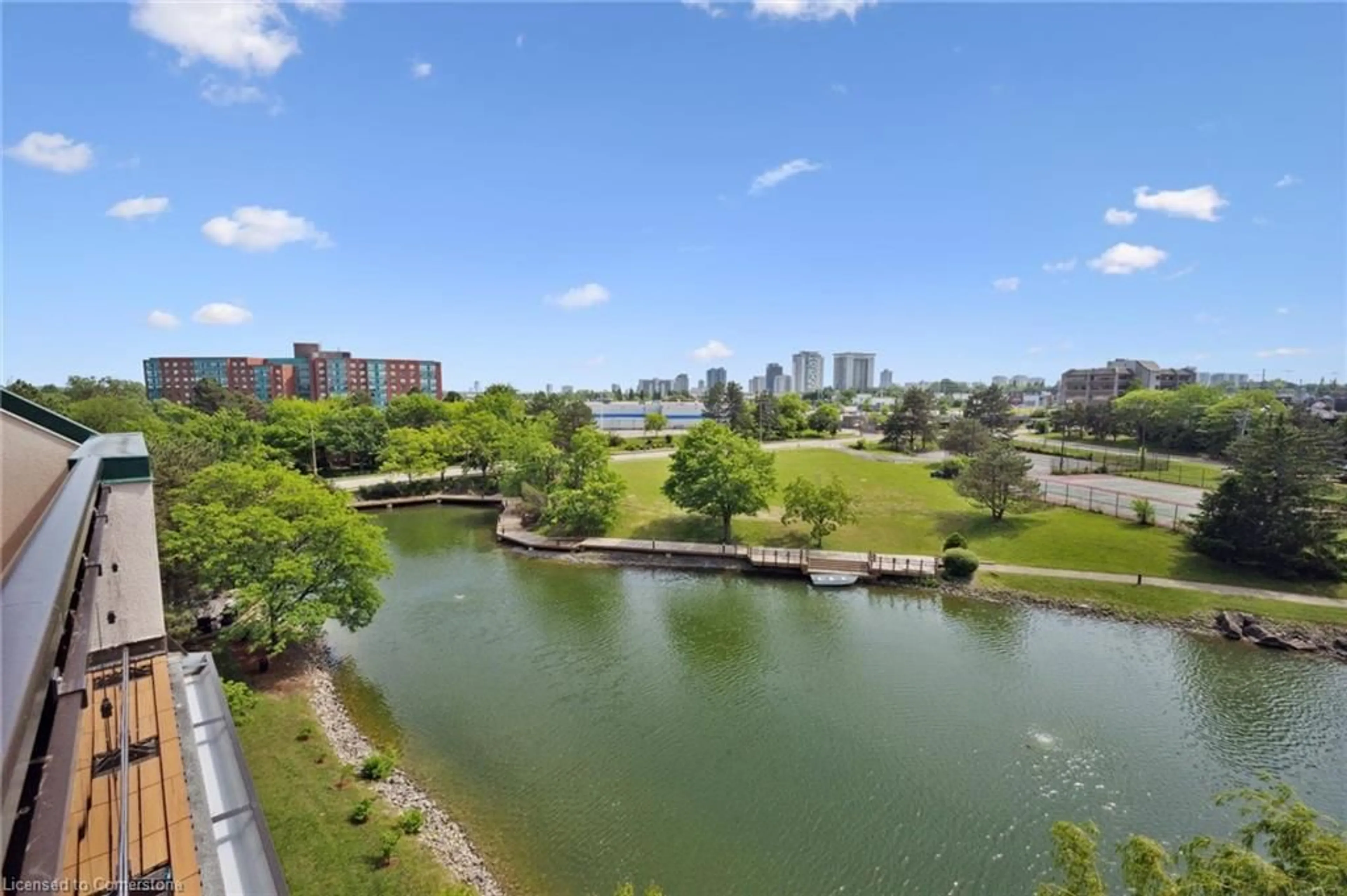 A pic from outside/outdoor area/front of a property/back of a property/a pic from drone, water/lake/river/ocean view for 54 Blue Springs Dr #62, Waterloo Ontario N2J 4M4