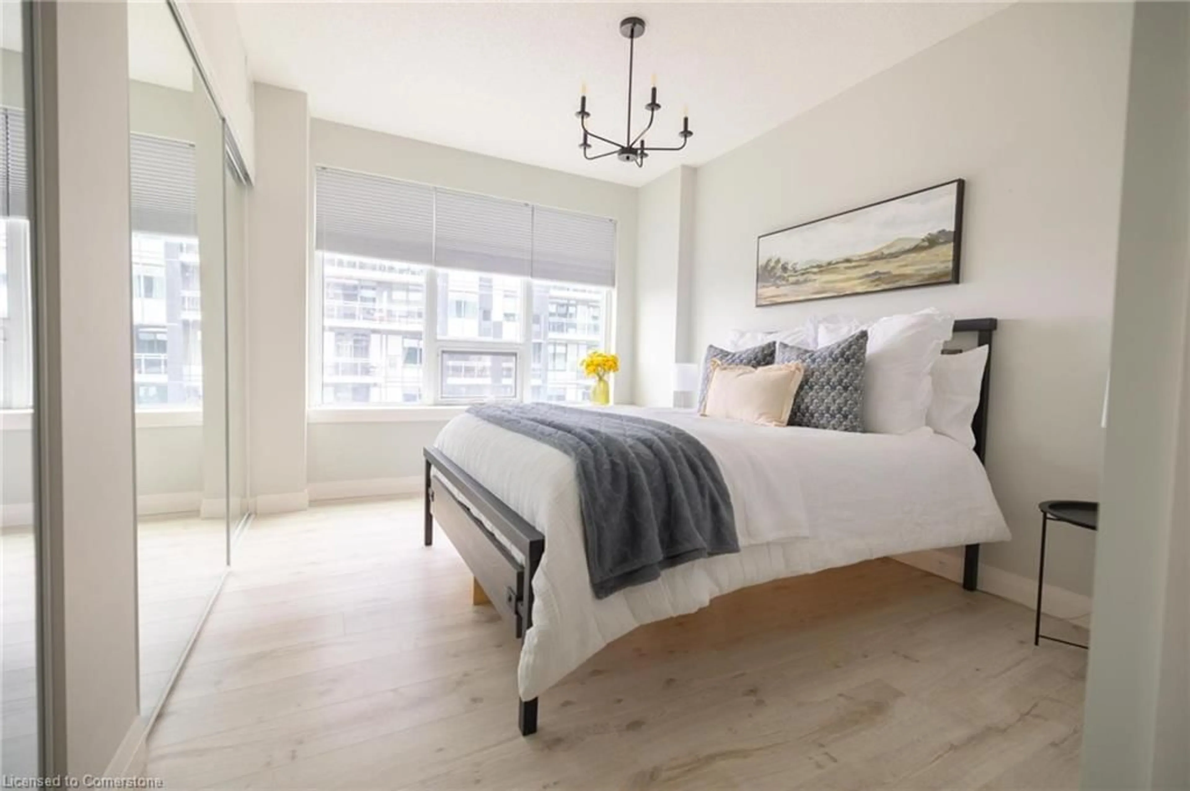 Bedroom with bed, wood/laminate floor for 53 Arthur St #415, Guelph Ontario N1E 0P5