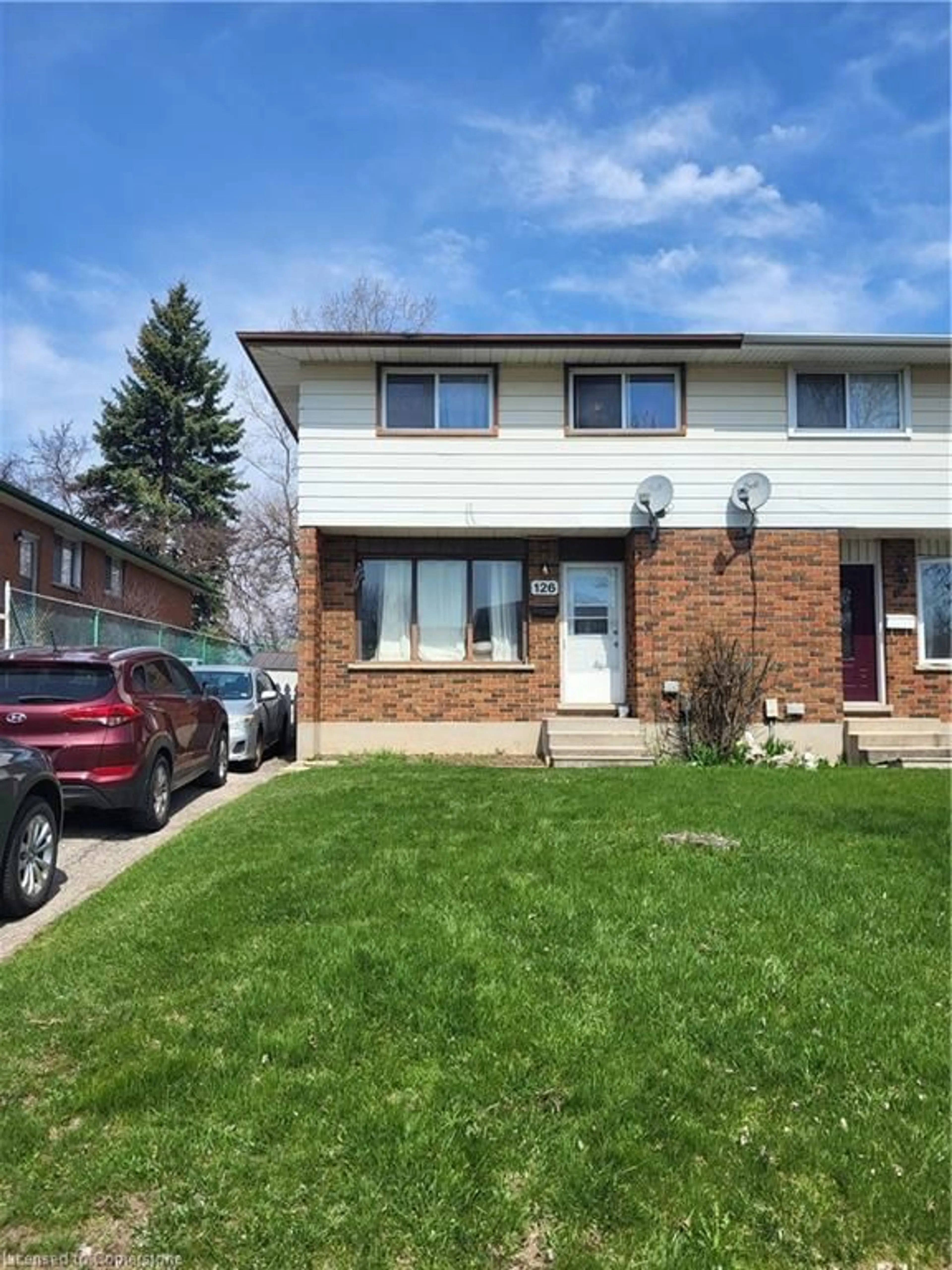 Home with vinyl exterior material, street for 126 Chandler Dr, Kitchener Ontario N2E 1G6