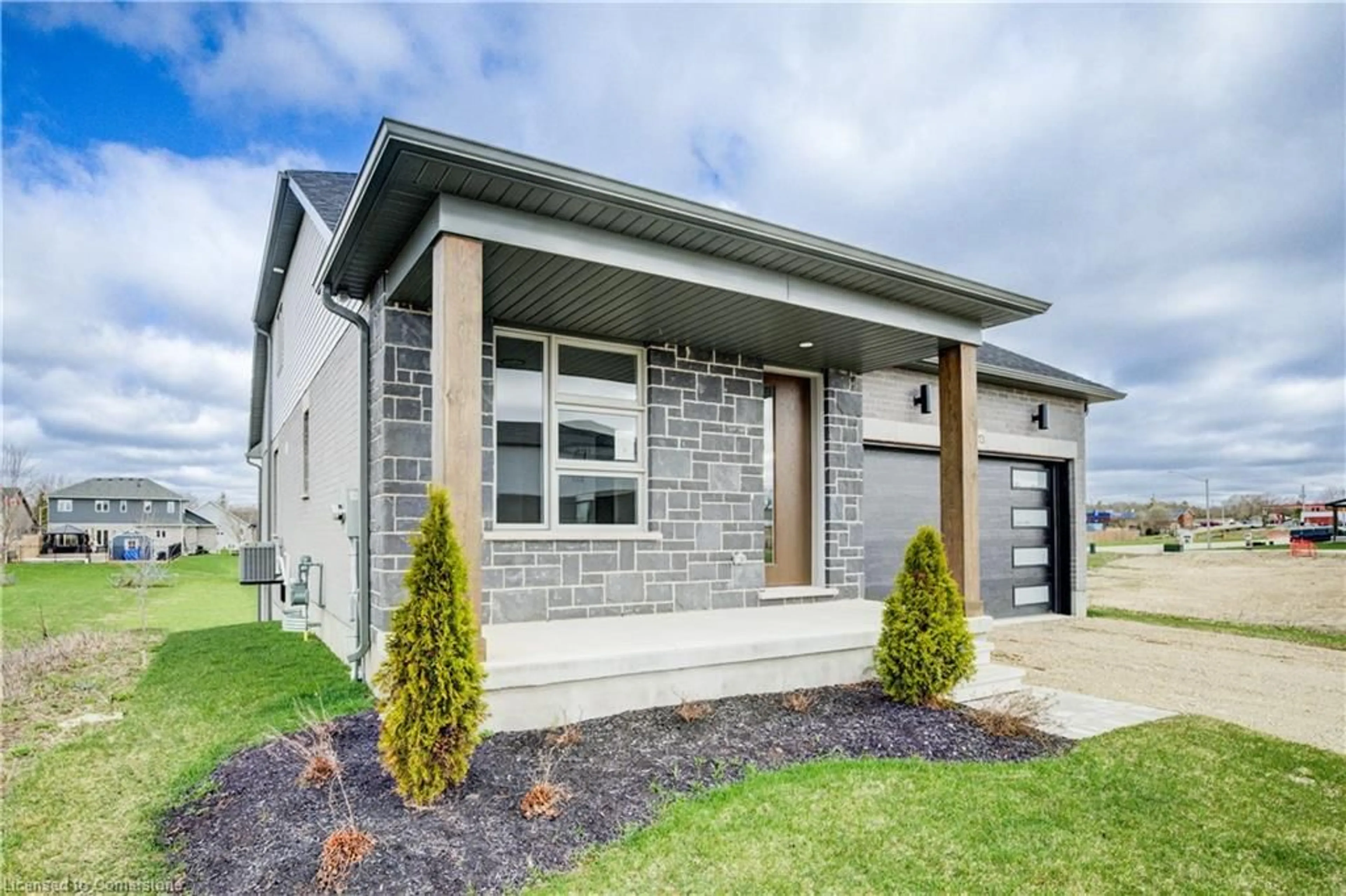 Home with brick exterior material, street for 113 Bean Street, Harriston Ontario N0G 1Z0