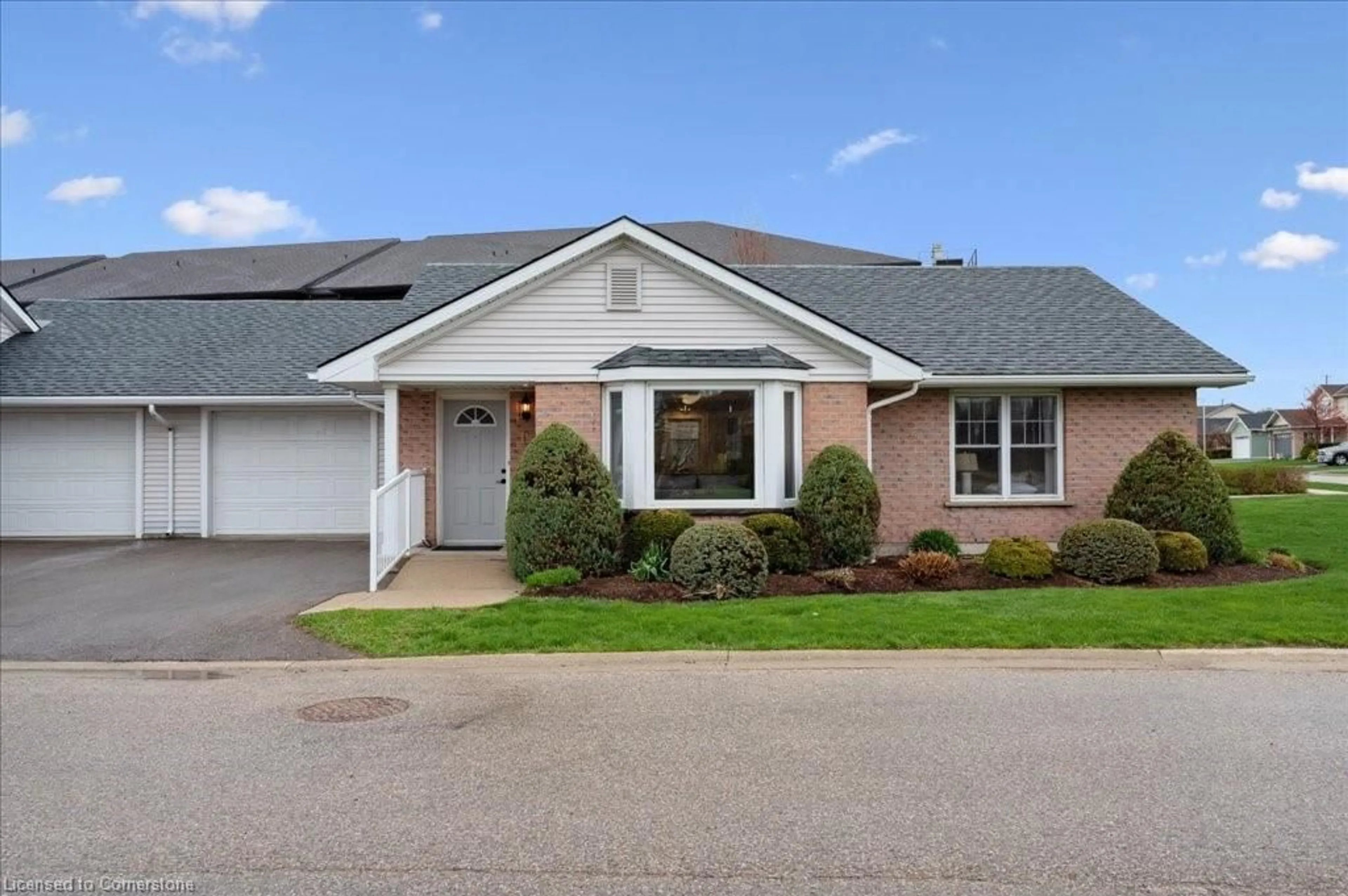 Home with vinyl exterior material, street for 750 Nelson Ave #13, Listowel Ontario N4W 3W1