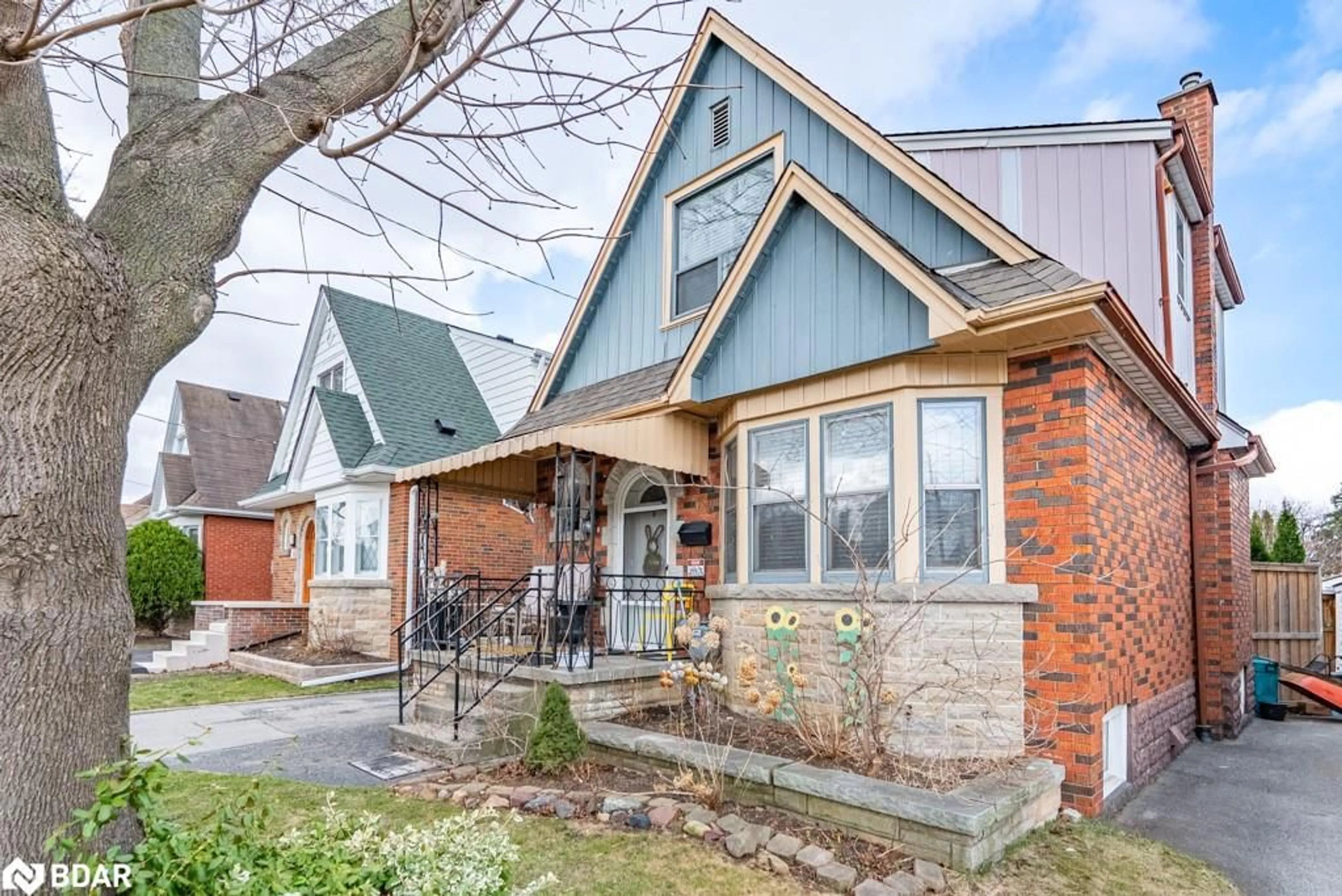Home with brick exterior material, street for 60 Cameron Ave, Hamilton Ontario L8K 2X2