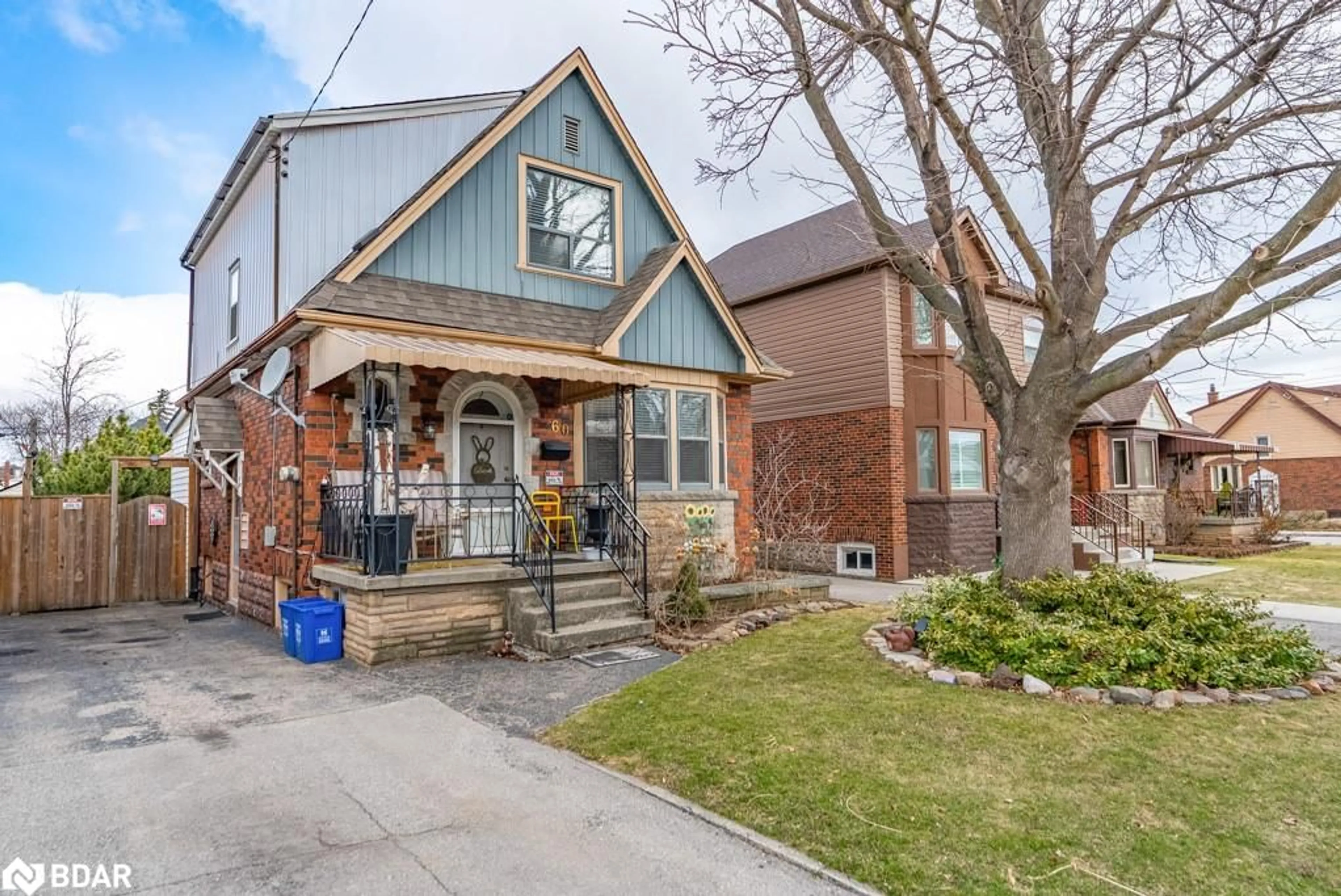 Home with brick exterior material, street for 60 Cameron Ave, Hamilton Ontario L8K 2X2