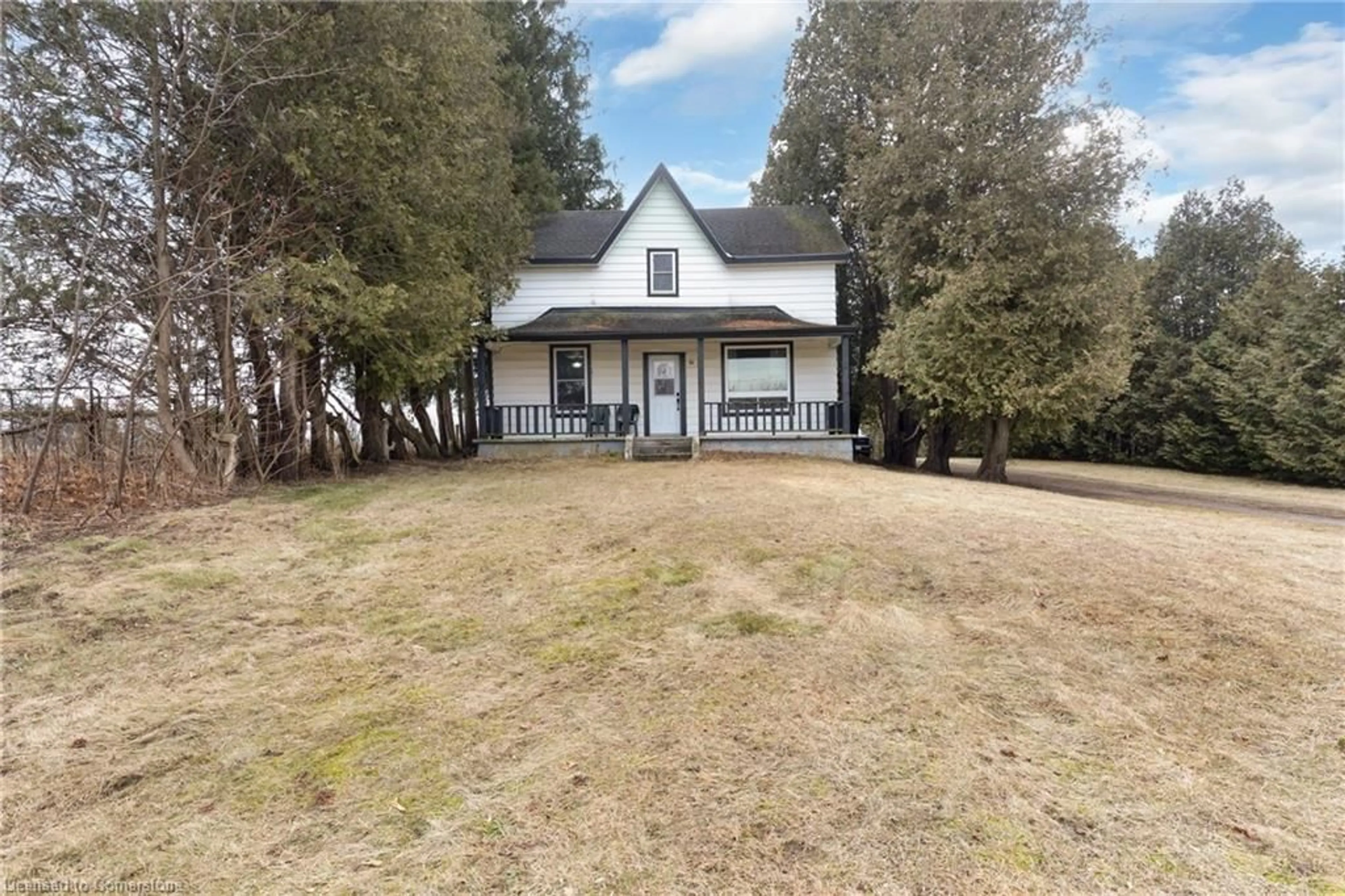 A pic from outside/outdoor area/front of a property/back of a property/a pic from drone, street for 1048 Windham Centre Rd, Windham Centre Ontario N0E 2A0