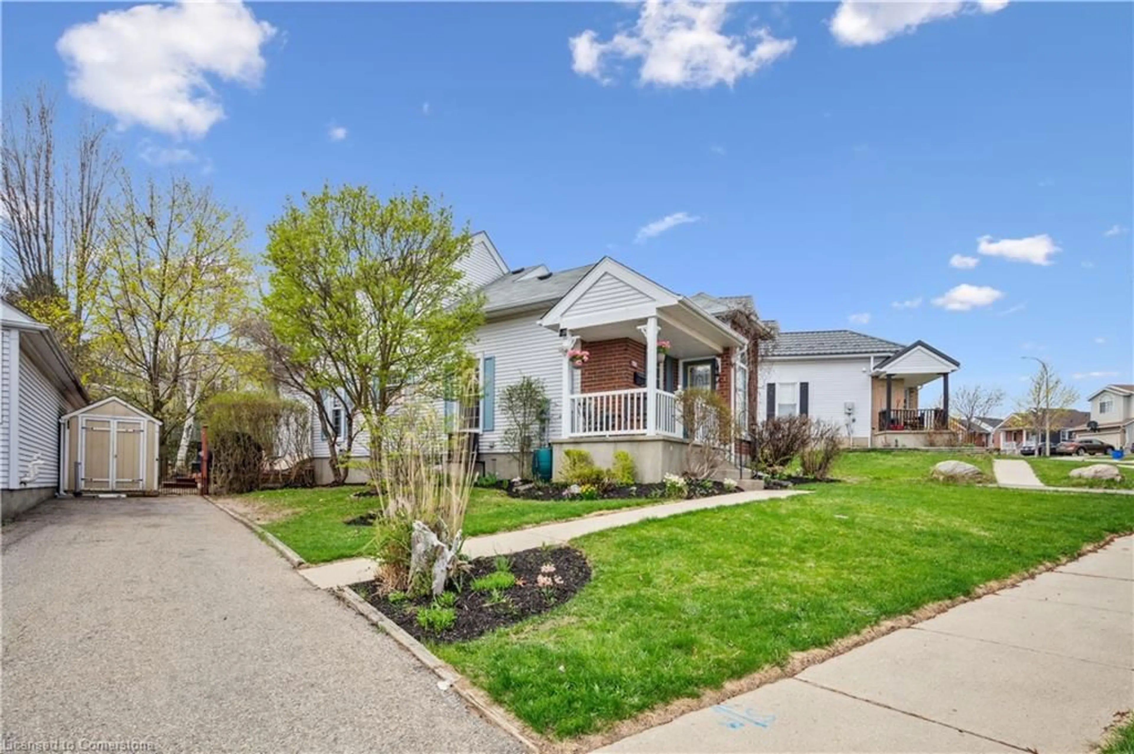 Home with vinyl exterior material, street for 45 Milfoil Cres, Kitchener Ontario N2E 3L2