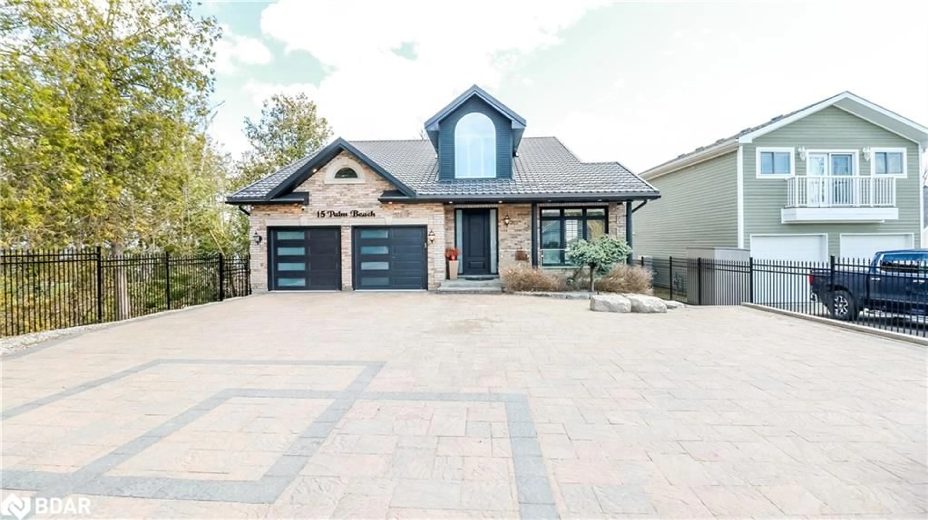 Home with brick exterior material, street for 15 Palm Beach Road, Oro-Medonte Ontario L0L 1T0