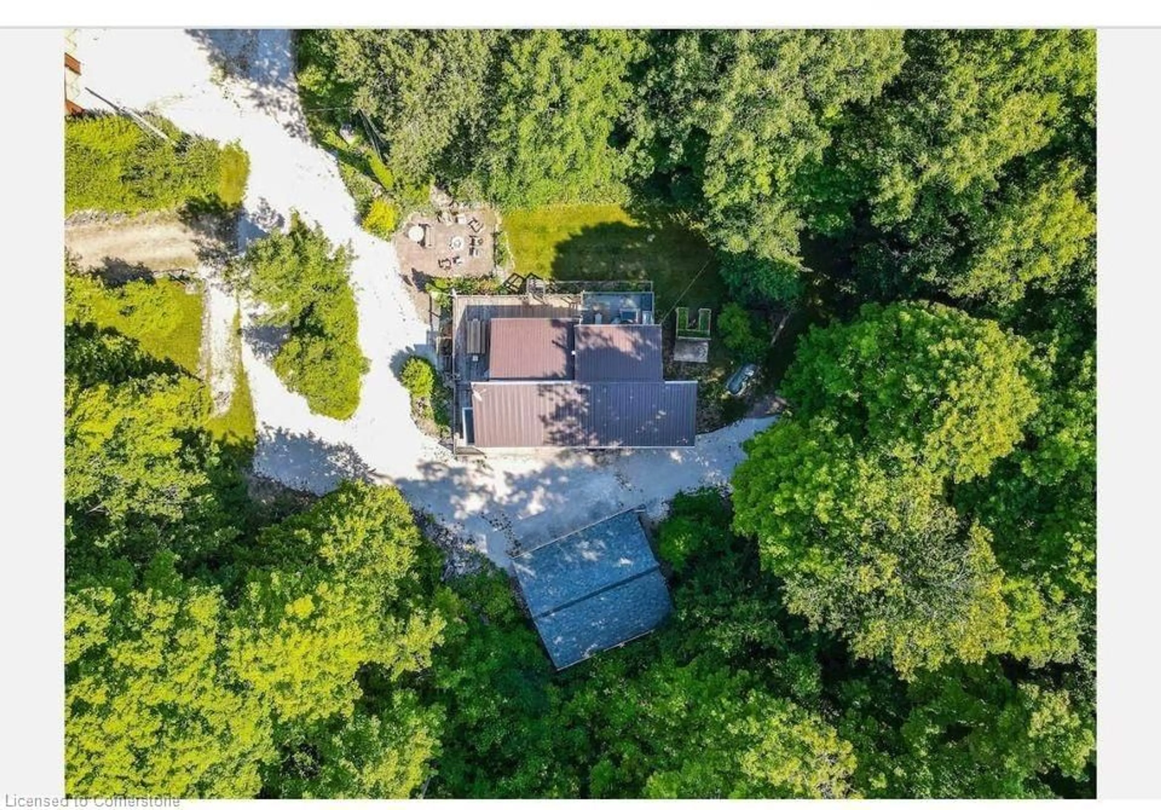 A pic from outside/outdoor area/front of a property/back of a property/a pic from drone, forest/trees view for 11 14th Ave, South Bruce Peninsula Ontario N0H 2T0