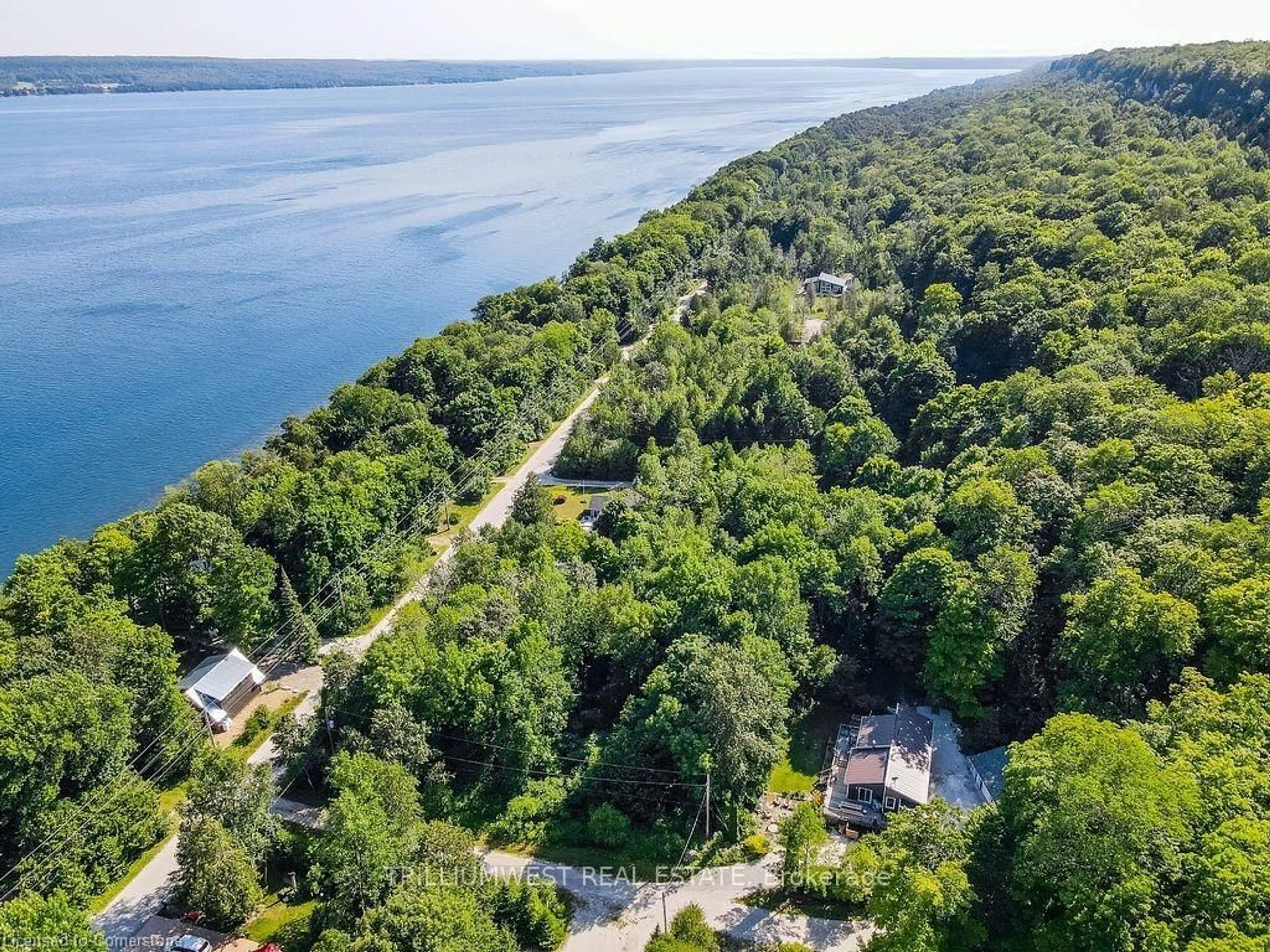 A pic from outside/outdoor area/front of a property/back of a property/a pic from drone, water/lake/river/ocean view for 11 14th Ave, South Bruce Peninsula Ontario N0H 2T0