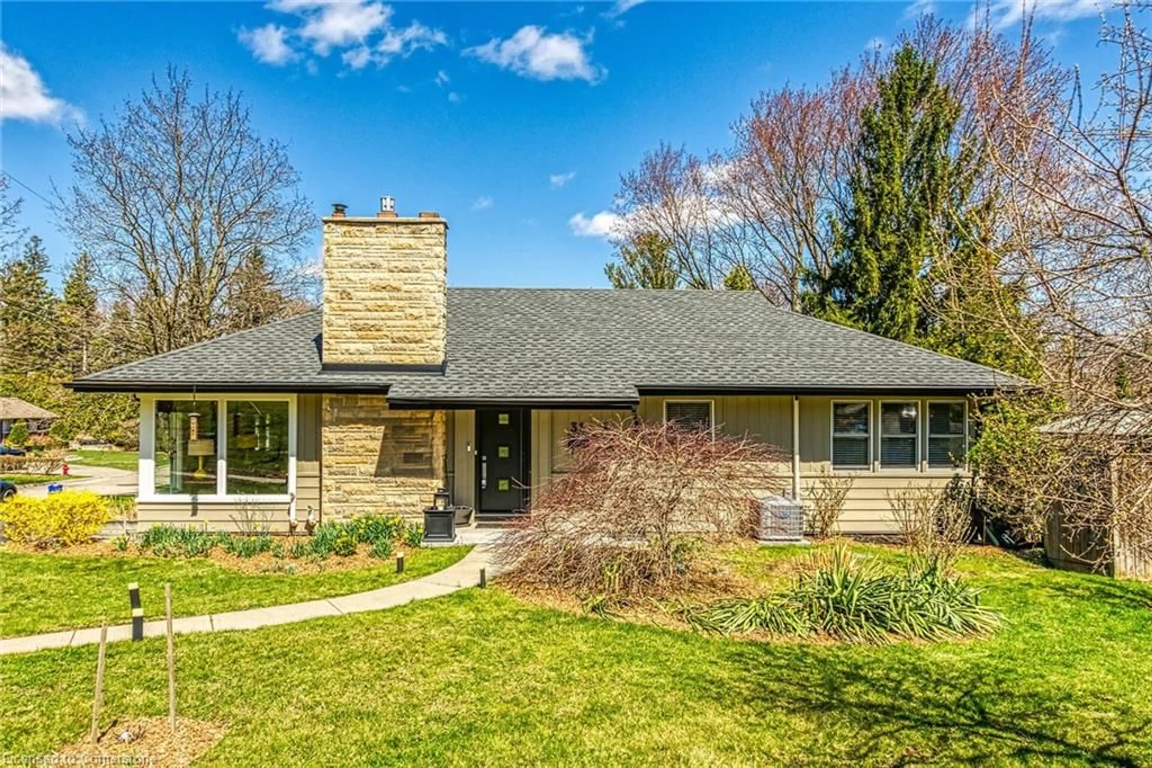 Home with brick exterior material, street for 31 Tally Ho Dr, Hamilton Ontario L9H 3M8