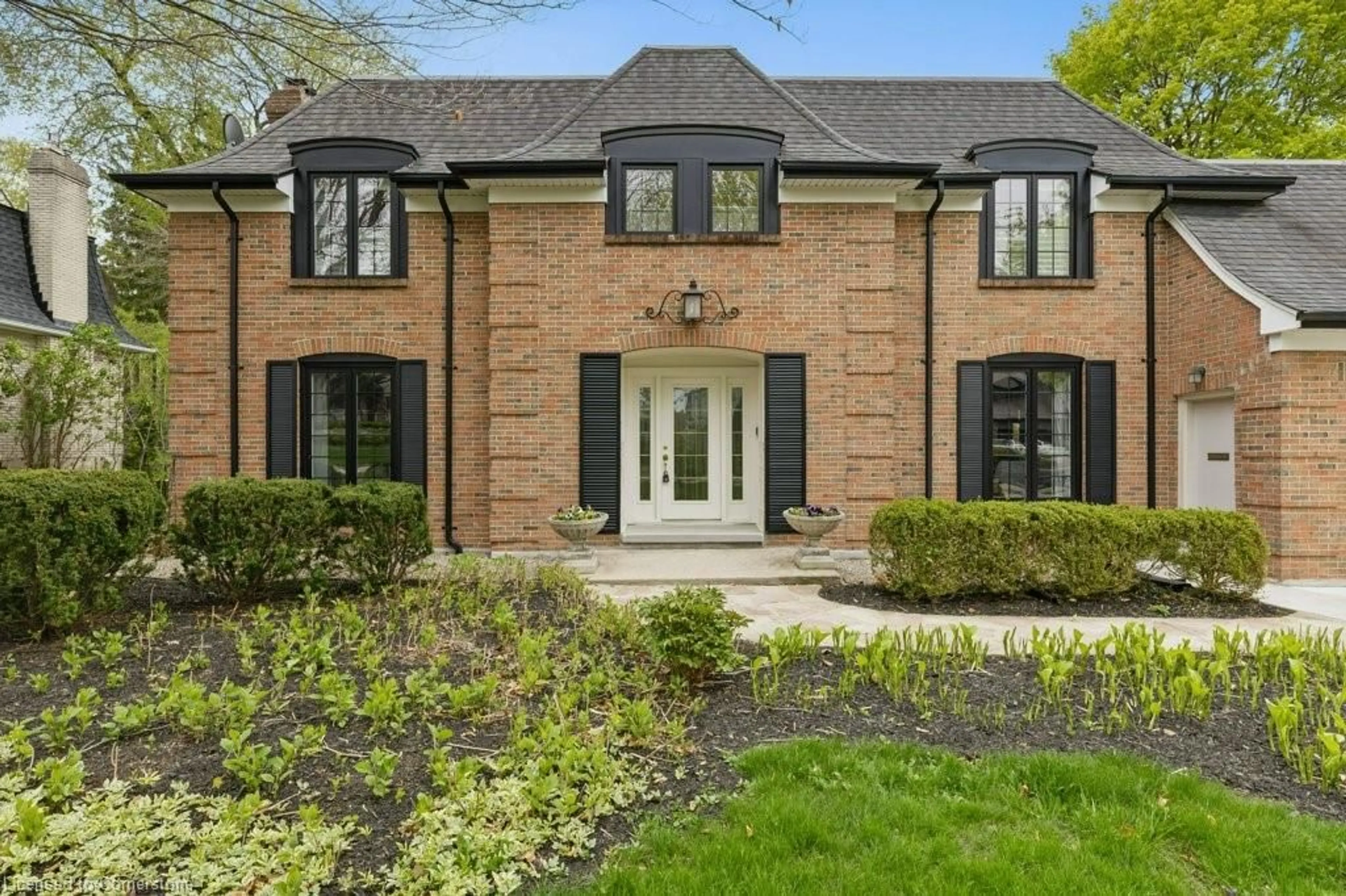Home with brick exterior material, street for 302 Shakespeare Dr, Waterloo Ontario N2L 2V1