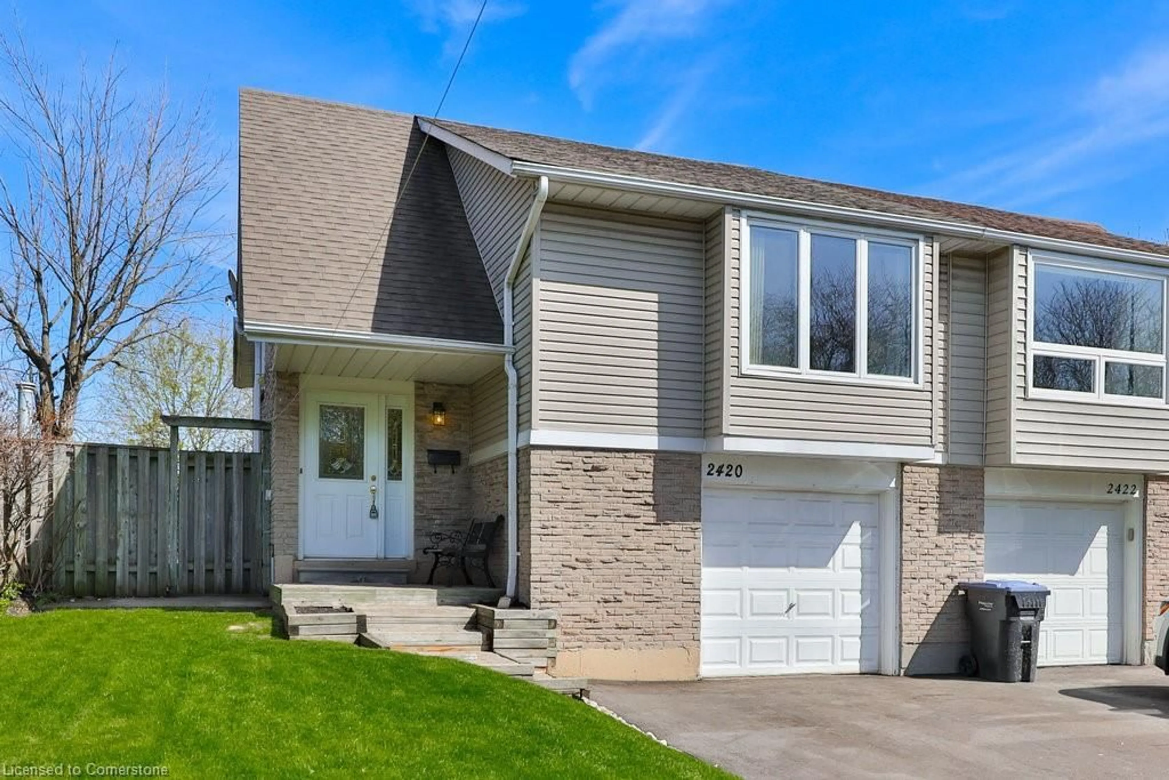 Home with vinyl exterior material, street for 2420 Mainroyal St, Mississauga Ontario L5L 1C9