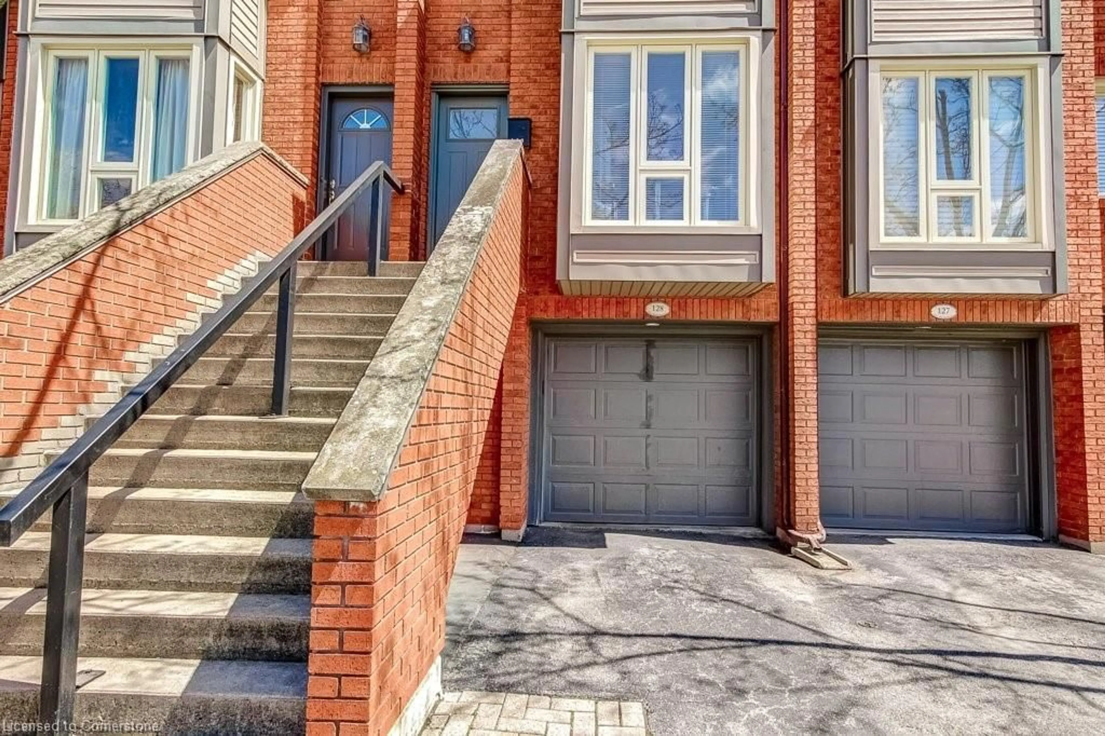 Home with brick exterior material, street for 895 Maple Ave #128, Burlington Ontario L7S 2H7