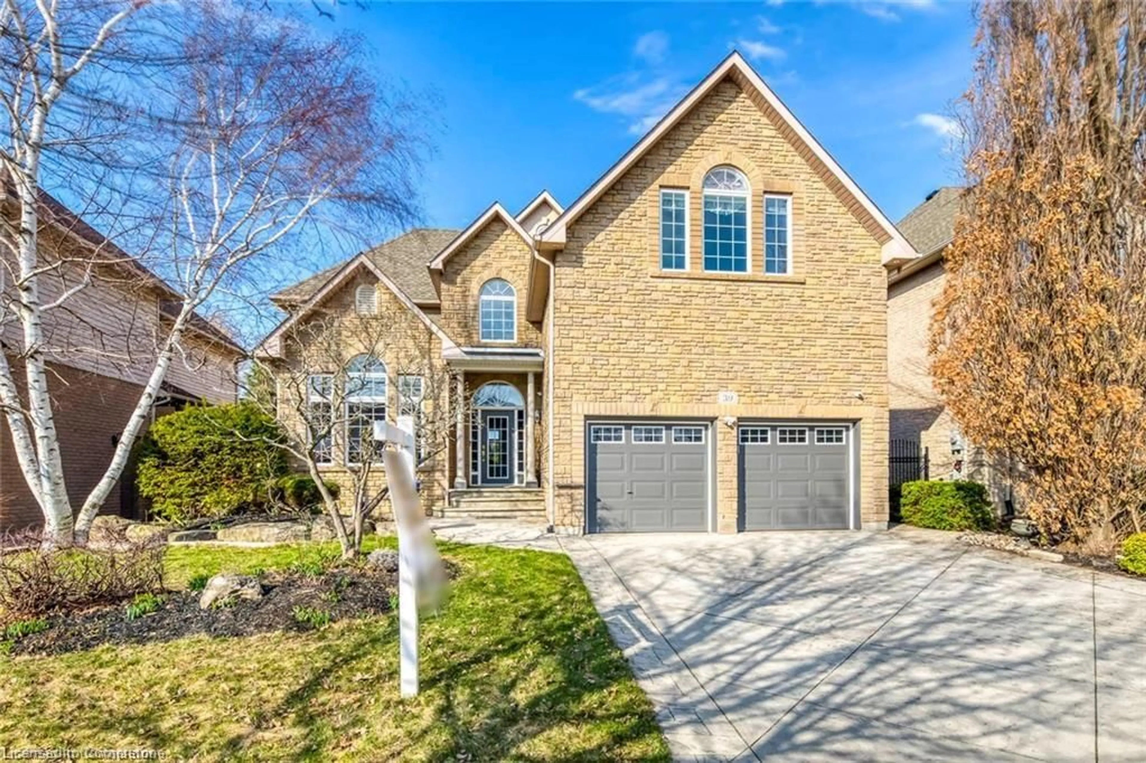 Home with brick exterior material, street for 39 Thoroughbred Blvd, Ancaster Ontario L9K 1M3