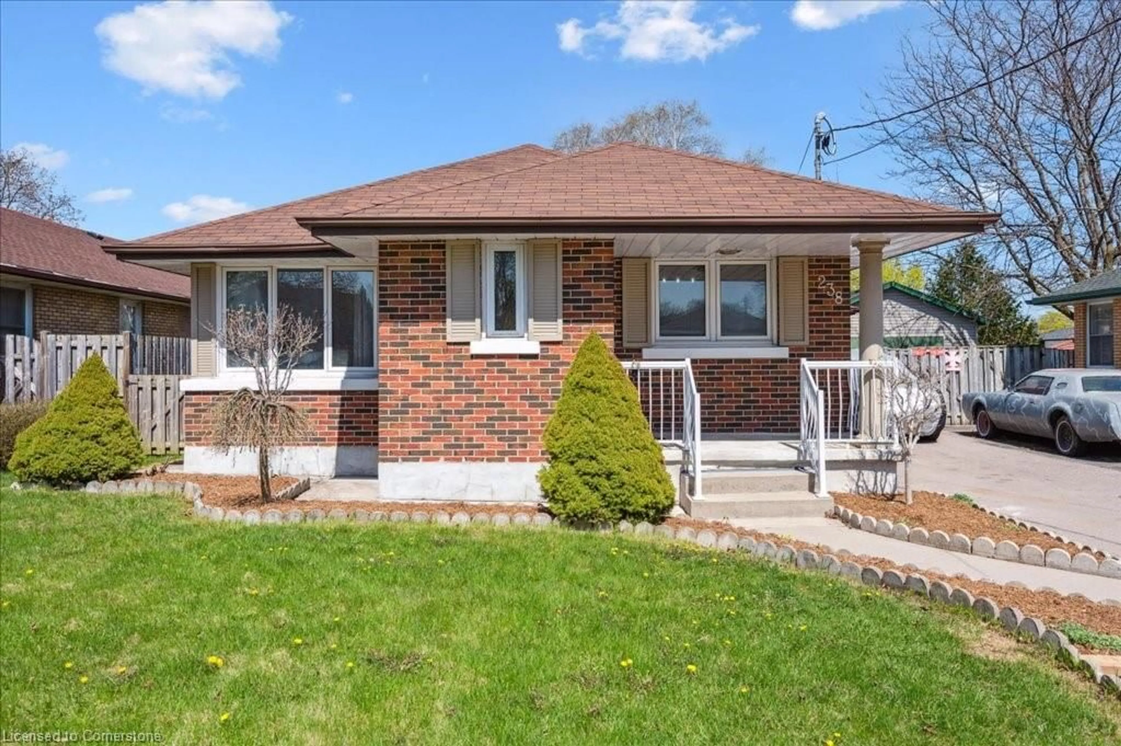 Home with brick exterior material, street for 238 Belmont Ave, Kitchener Ontario N2M 1M2