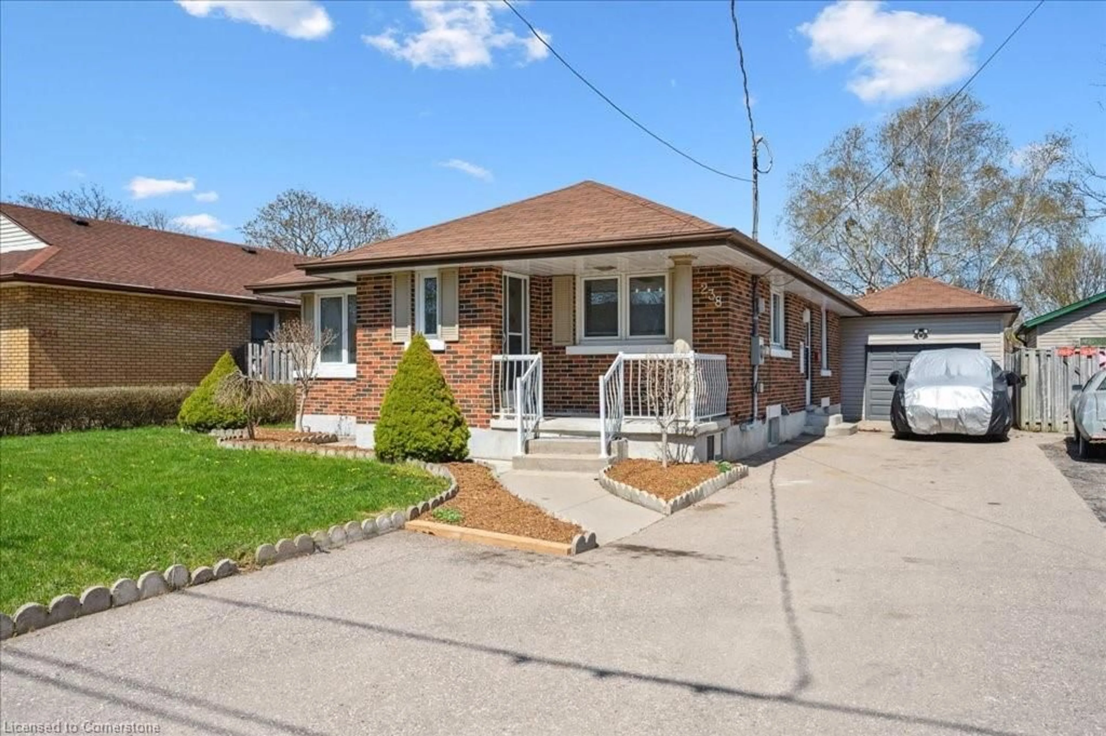 Home with brick exterior material, street for 238 Belmont Ave, Kitchener Ontario N2M 1M2