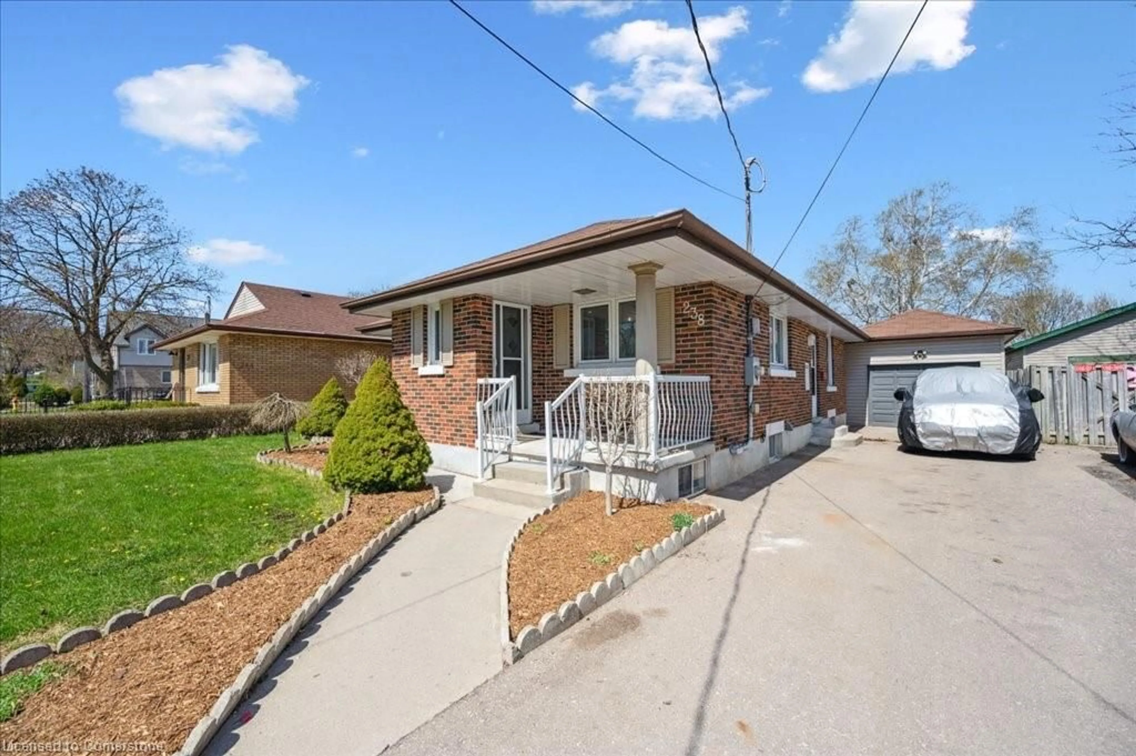 Home with brick exterior material, street for 238 Belmont Ave, Kitchener Ontario N2M 1M2