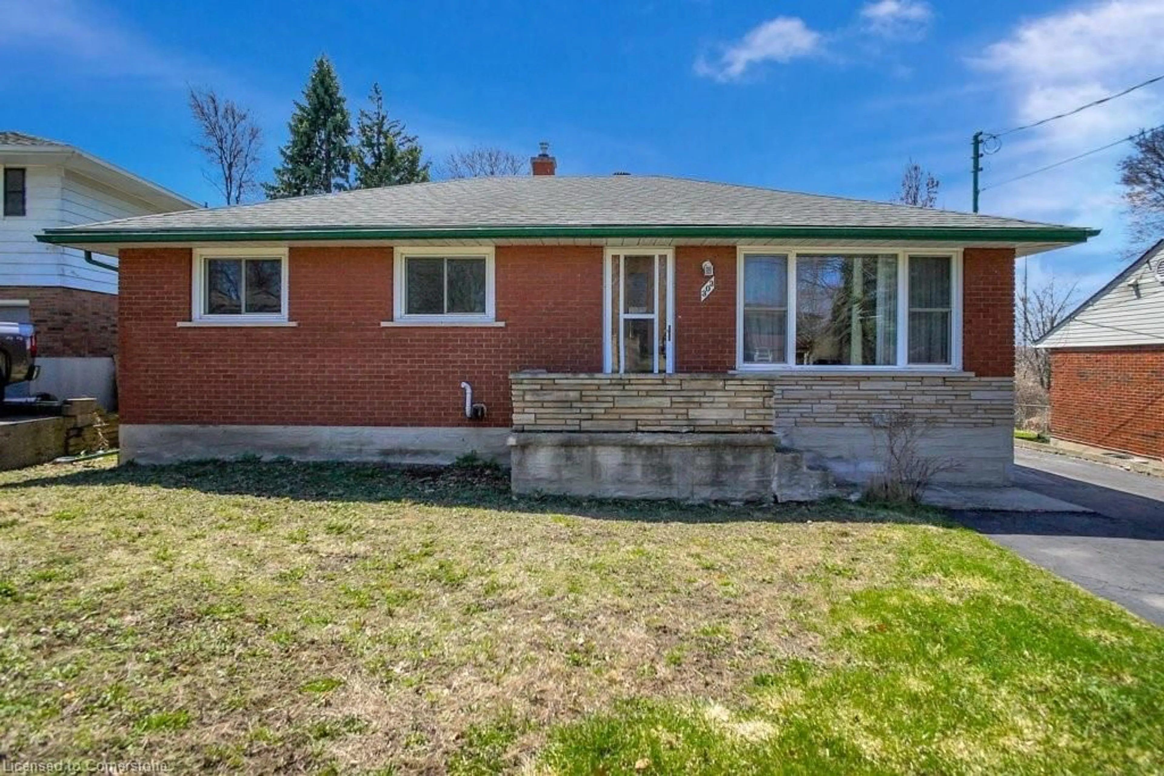 Home with brick exterior material, street for 303 Dixon St, Kitchener Ontario N2G 3G1