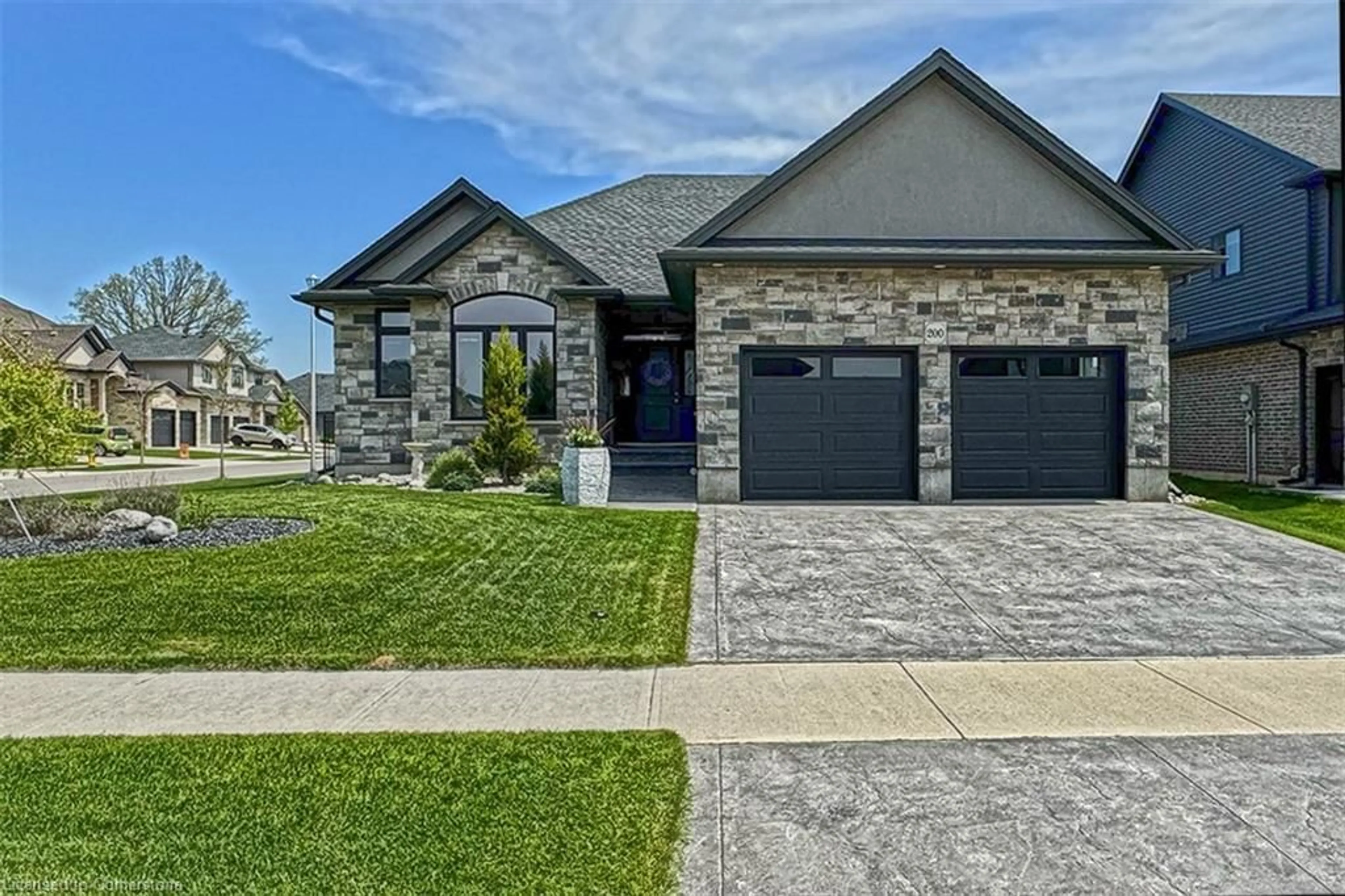 Home with brick exterior material, street for 200 Juniper St, Woodstock Ontario N4S 0E1