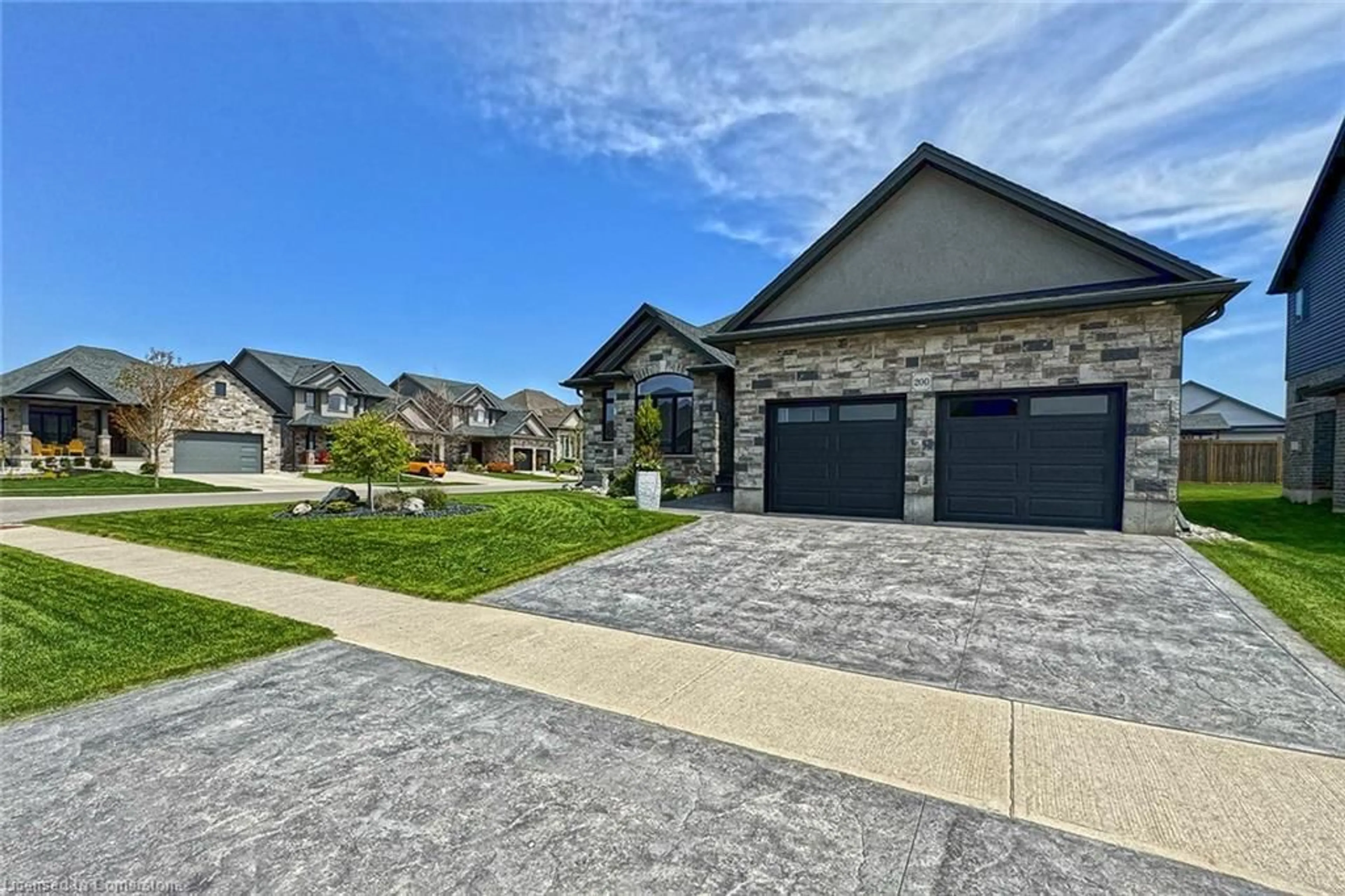 Home with brick exterior material, street for 200 Juniper St, Woodstock Ontario N4S 0E1