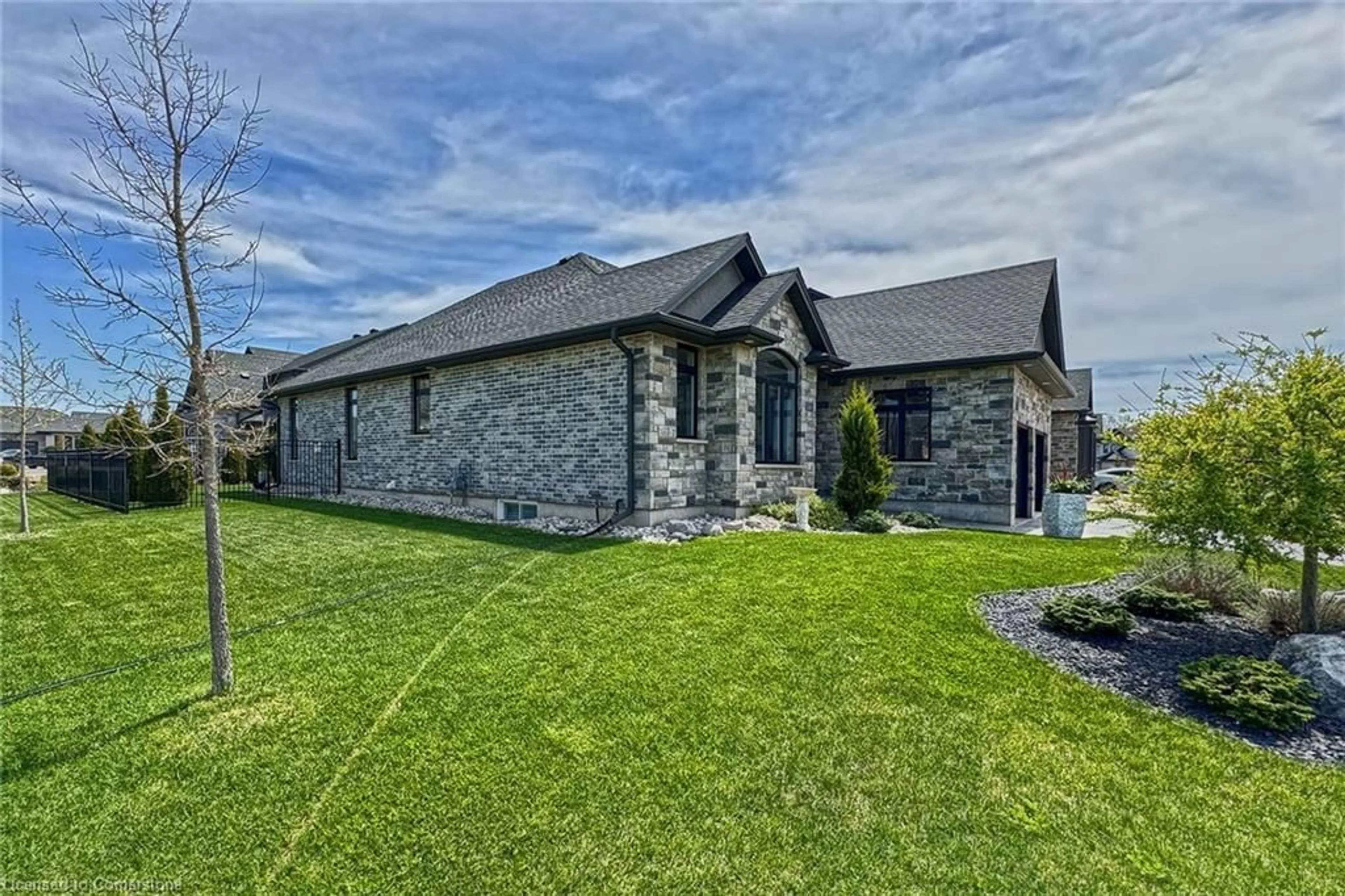 Home with brick exterior material, street for 200 Juniper St, Woodstock Ontario N4S 0E1