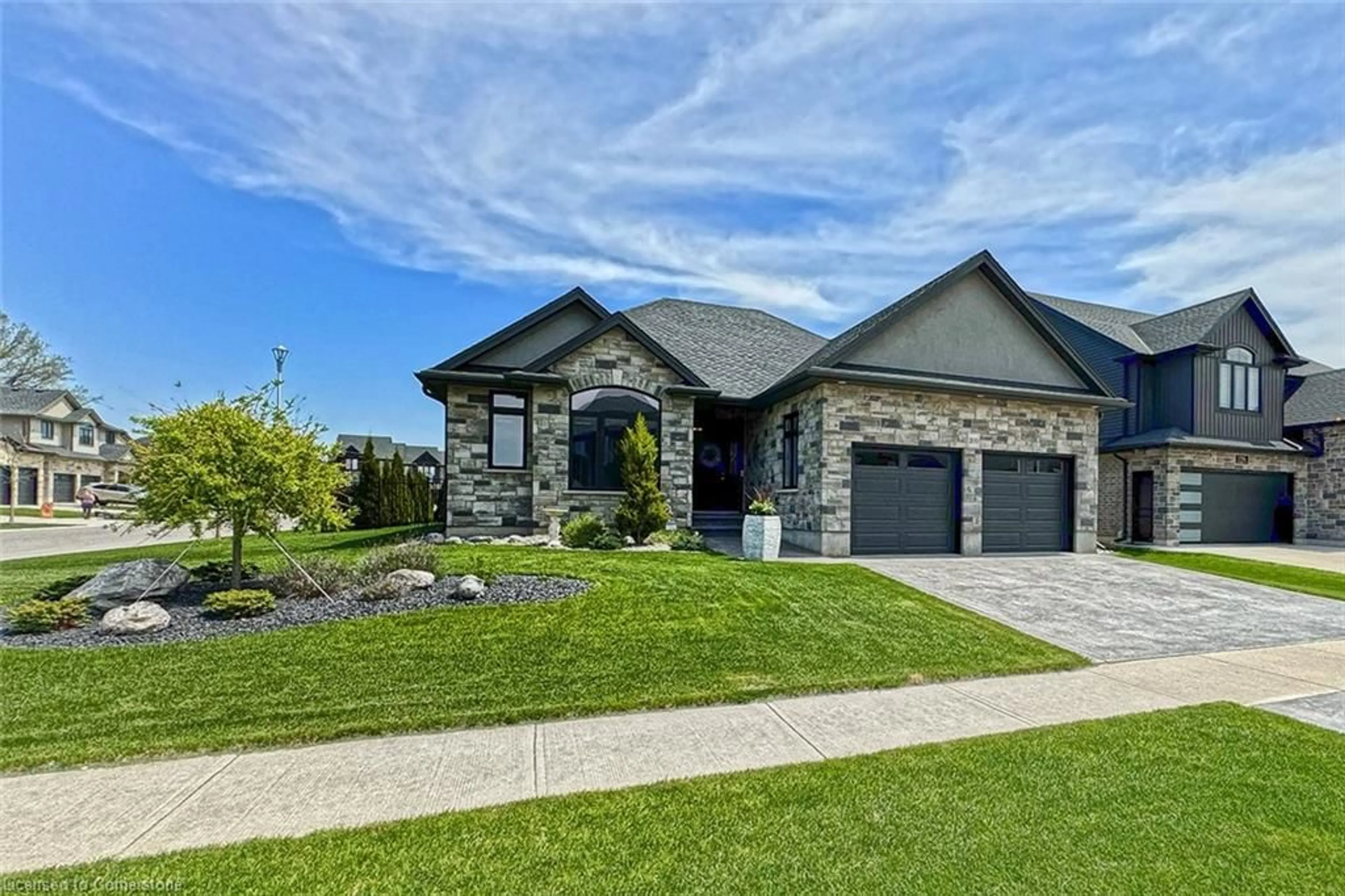 Home with brick exterior material, street for 200 Juniper St, Woodstock Ontario N4S 0E1
