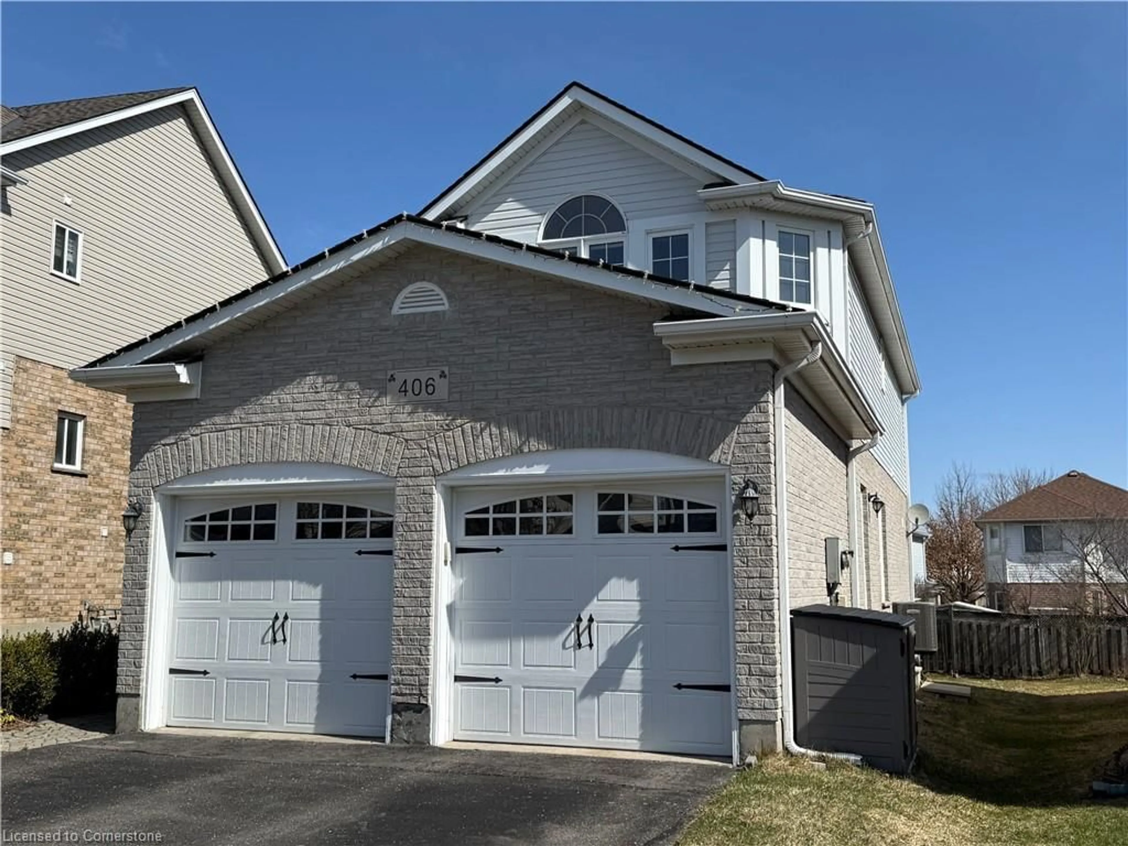 Home with brick exterior material, street for 406 Woodrow Dr, Waterloo Ontario N2T 2V7