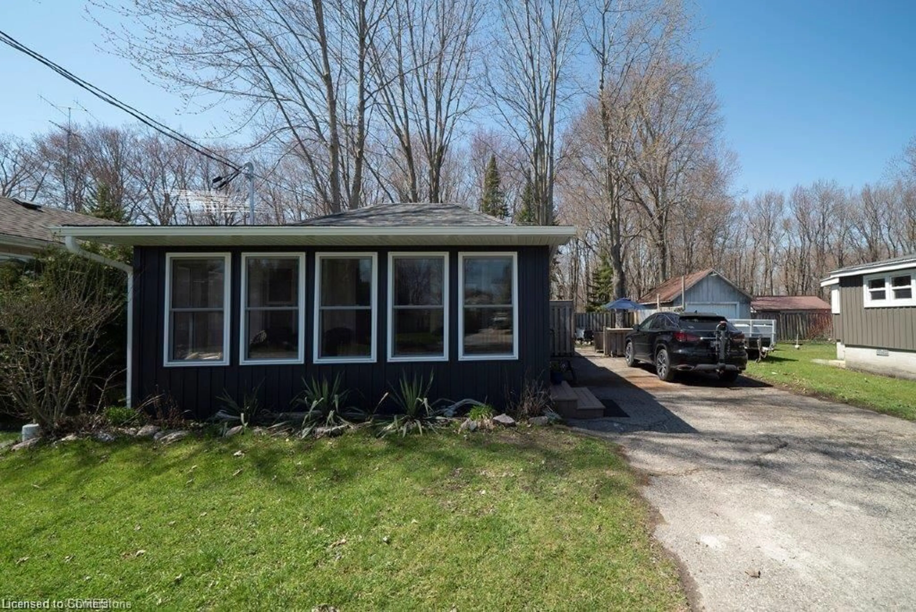 Home with vinyl exterior material, street for 219 Cedar Dr, Turkey Point Ontario N0E 1T0