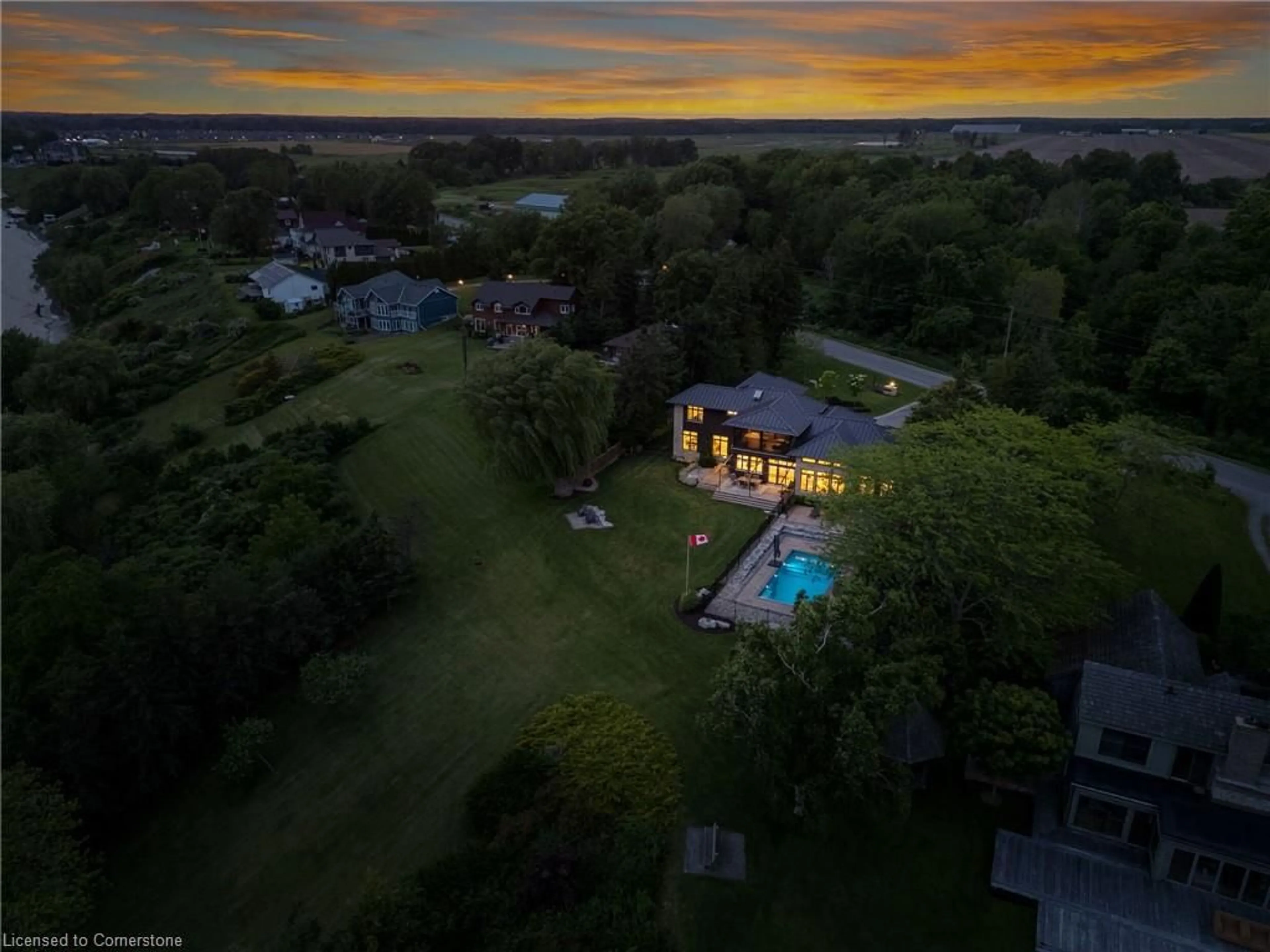 A pic from outside/outdoor area/front of a property/back of a property/a pic from drone, water/lake/river/ocean view for 336 New Lakeshore Rd, Port Dover Ontario N0A 1N3