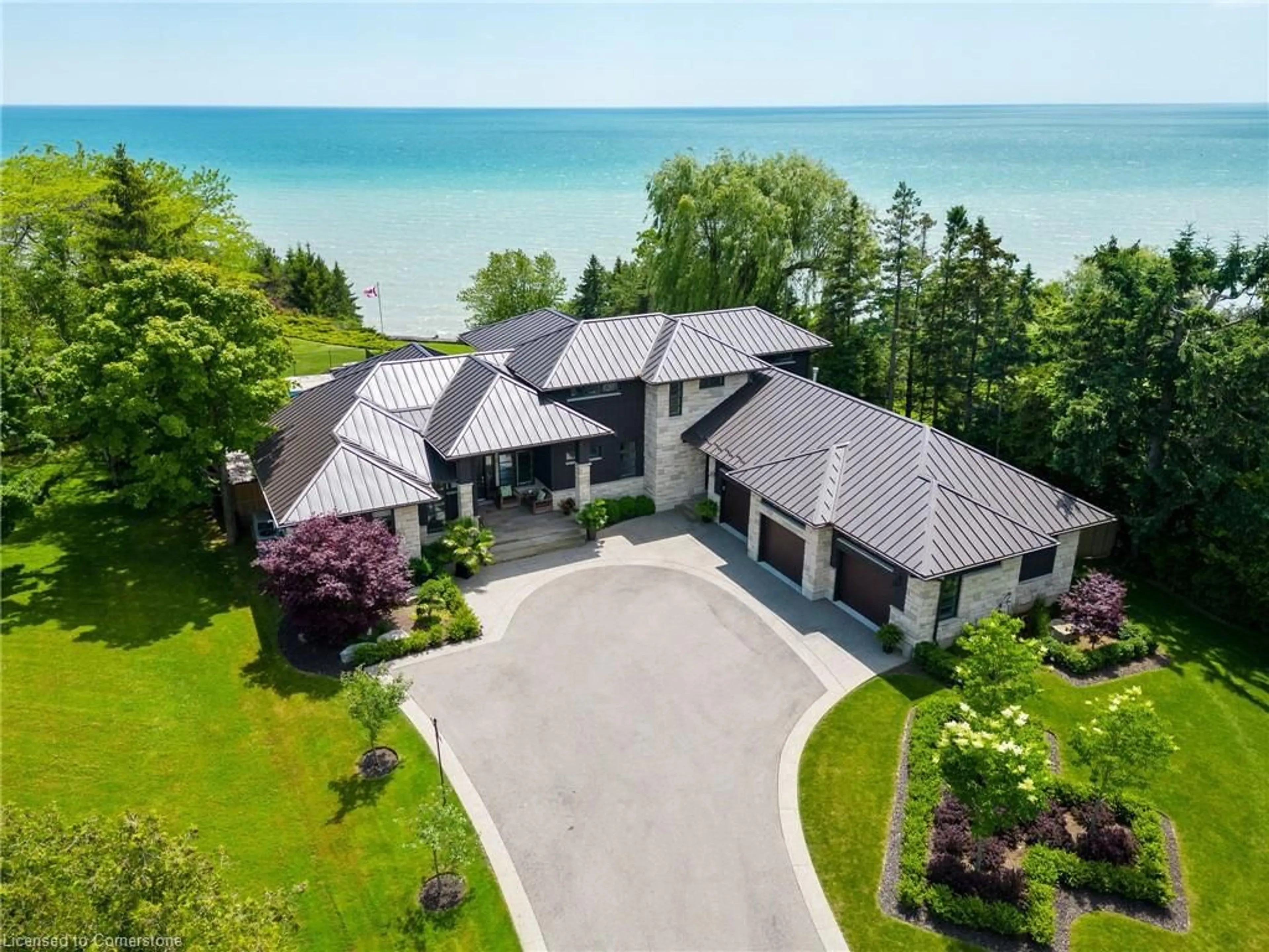 A pic from outside/outdoor area/front of a property/back of a property/a pic from drone, water/lake/river/ocean view for 336 New Lakeshore Rd, Port Dover Ontario N0A 1N3