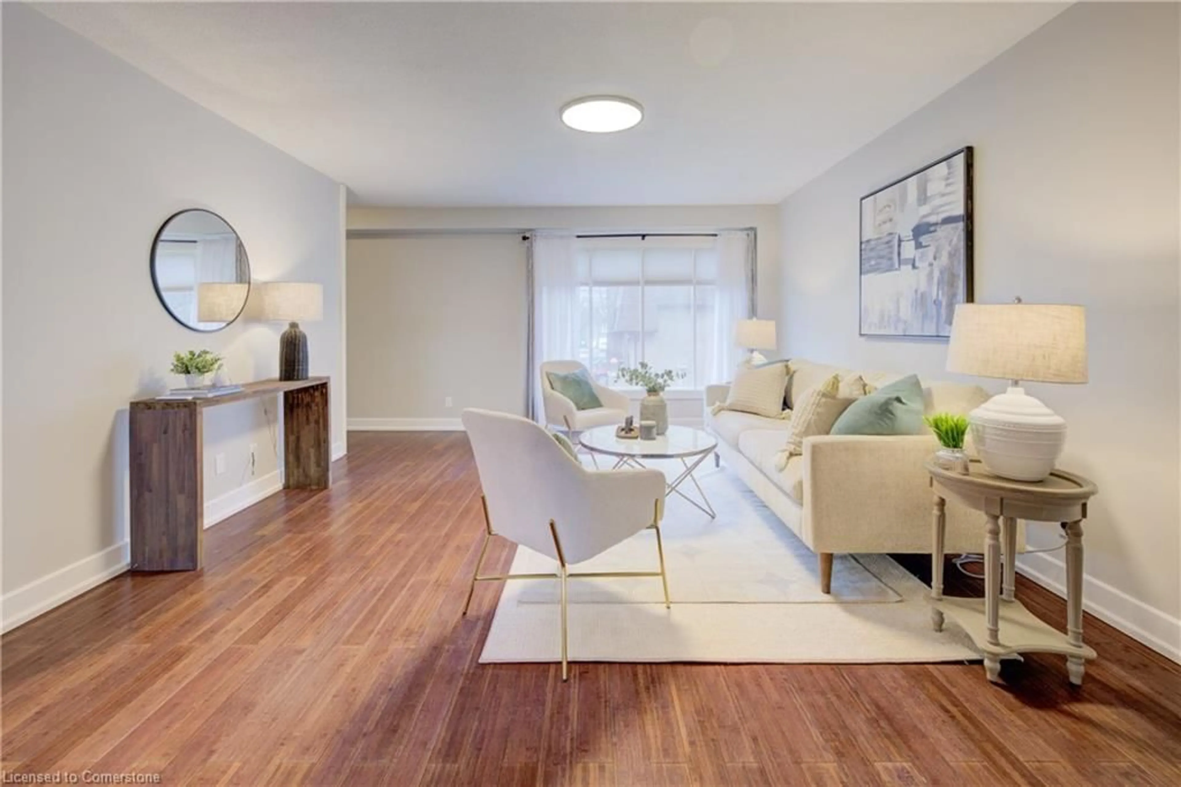 Living room with furniture, wood/laminate floor for 49 Cedarwoods Cres #52, Kitchener Ontario N2C 2L1