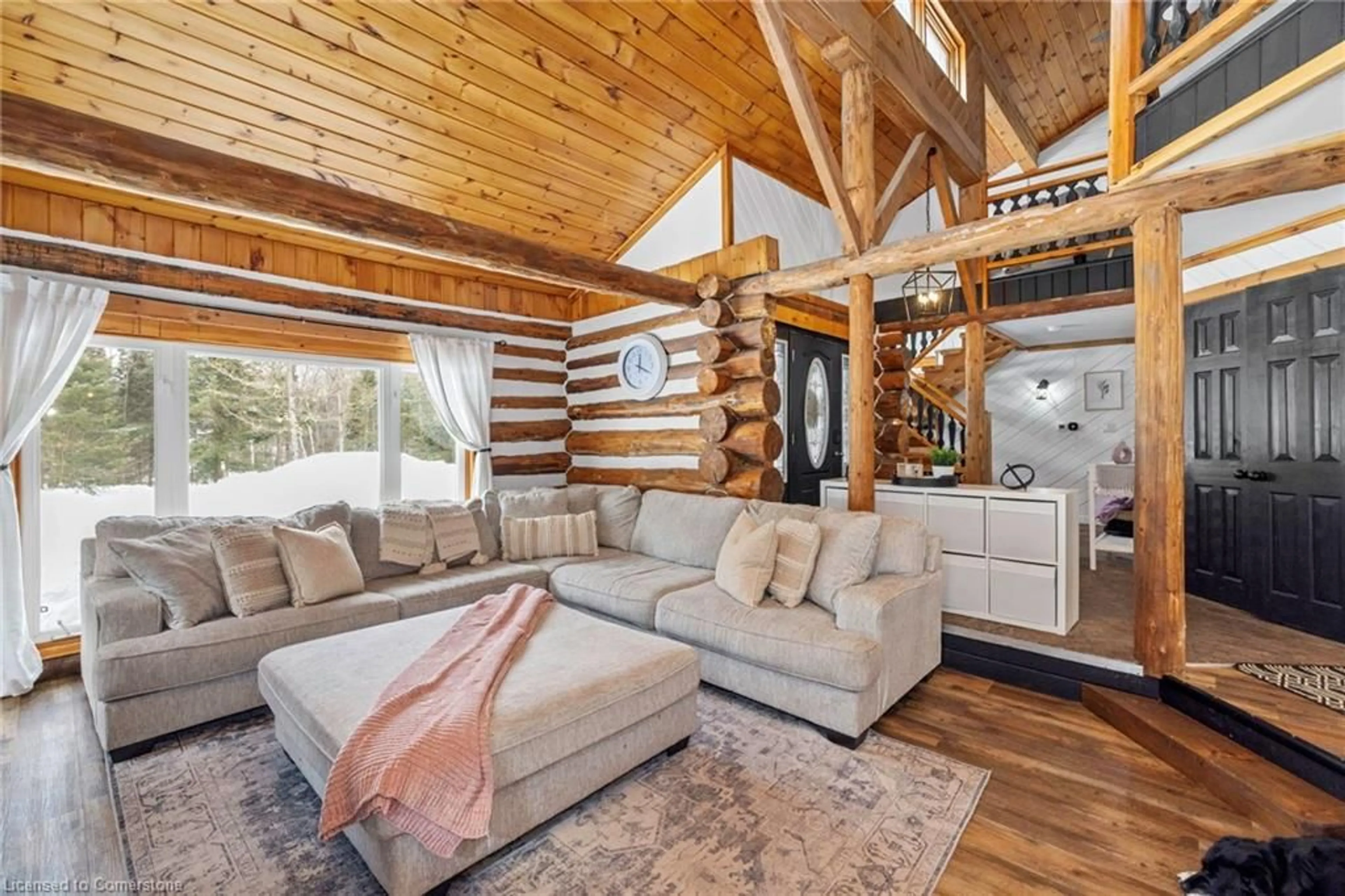 Living room with furniture, wood/laminate floor for 239 Old Government Rd, Emsdale Ontario P0A 1J0